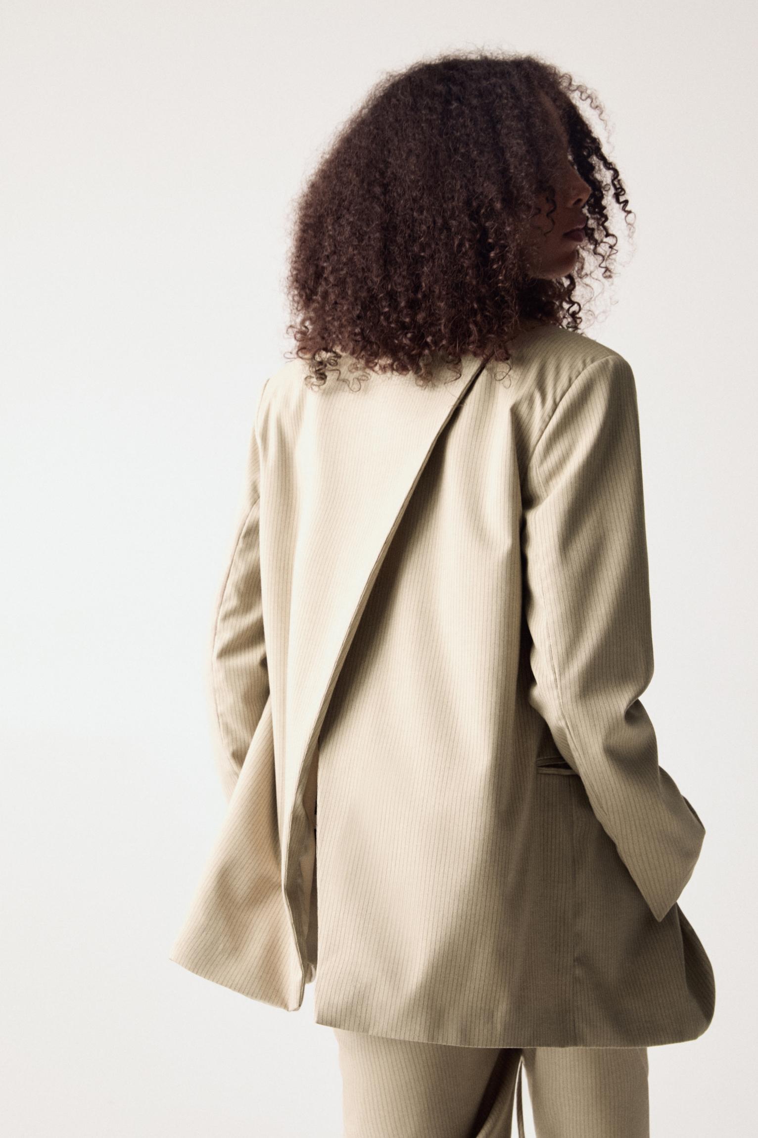 Asymmetric open back blazer Product Image