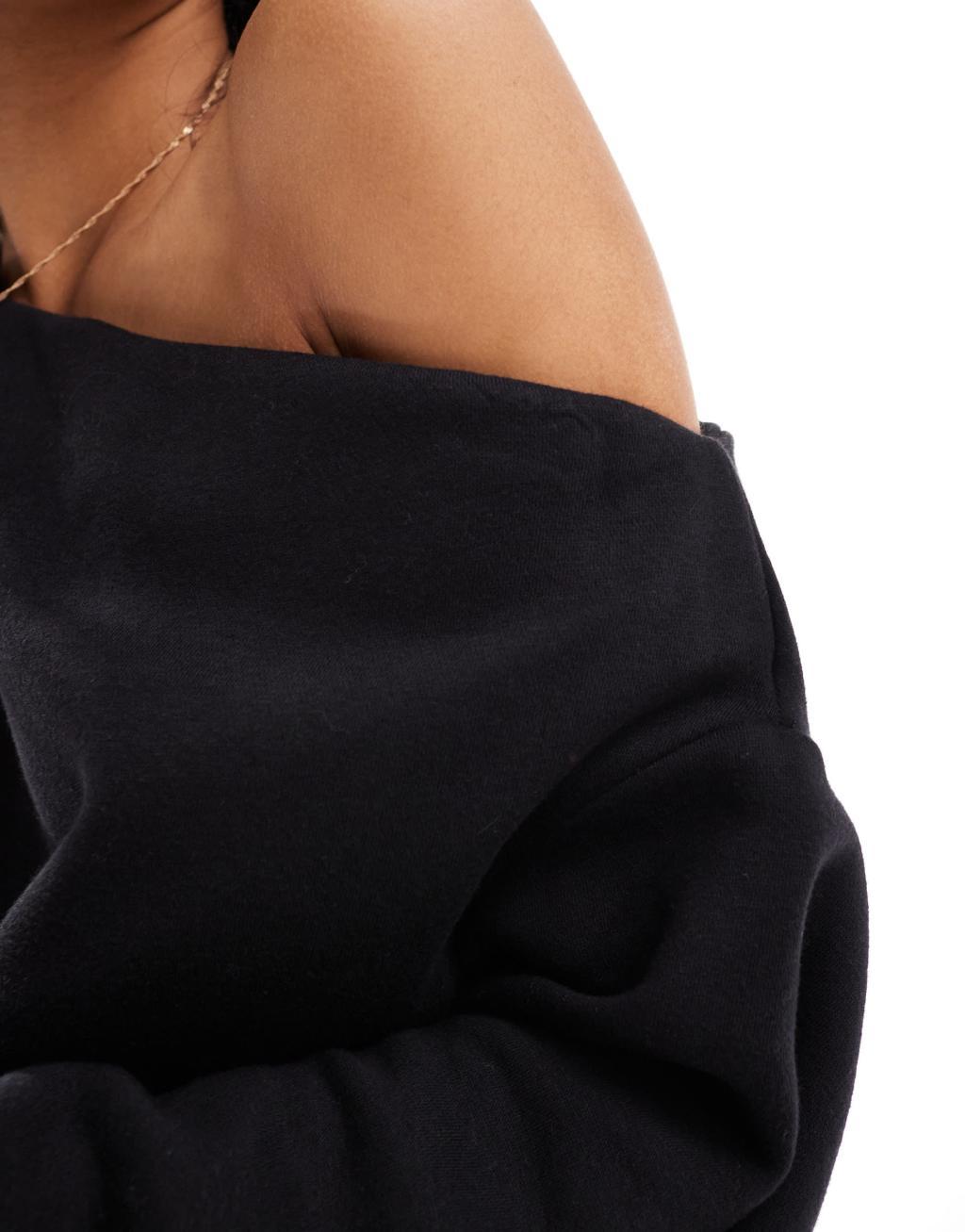 ASOS DESIGN asym sweat mini dress in black Product Image