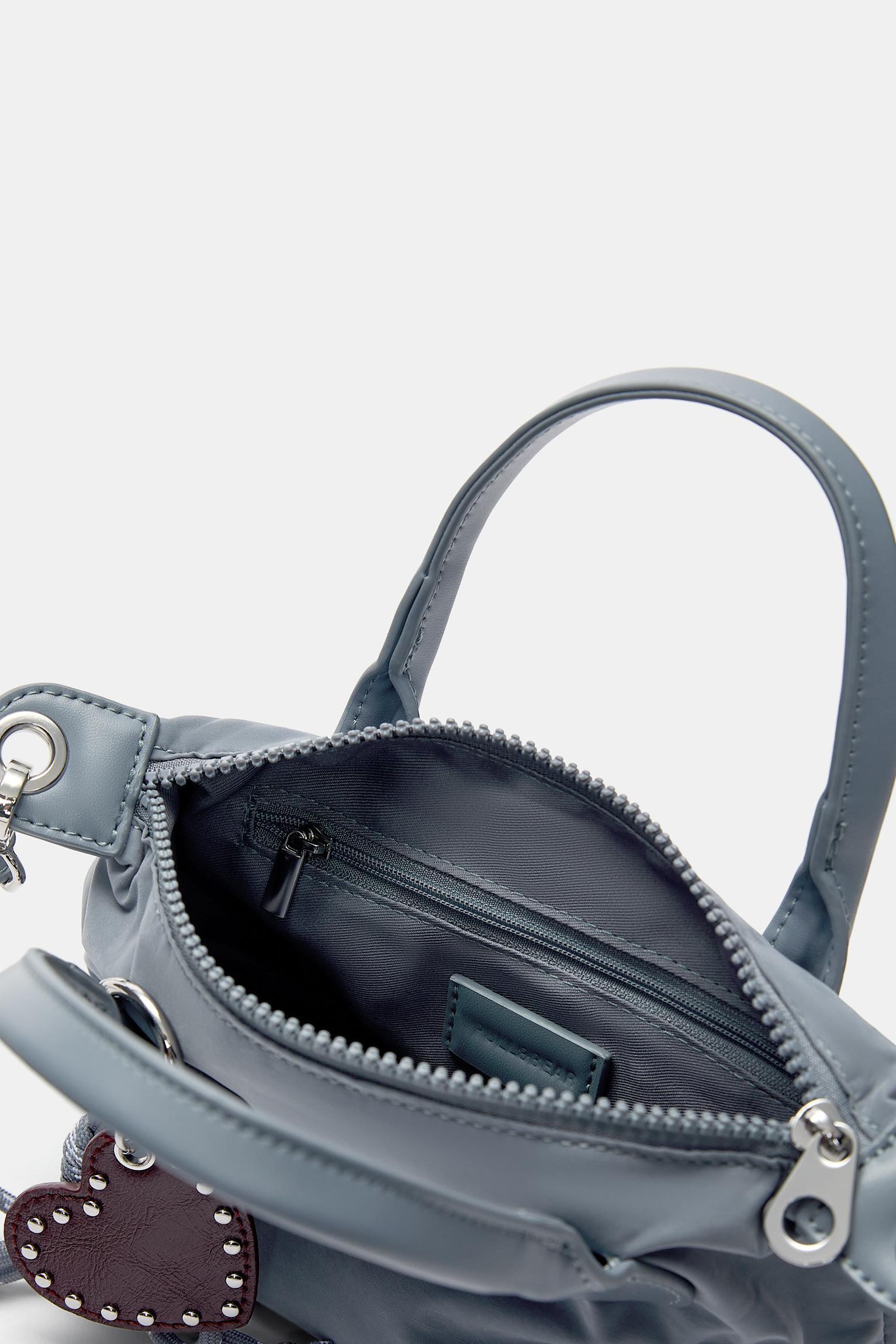 Mini embellished crossbody bag Product Image