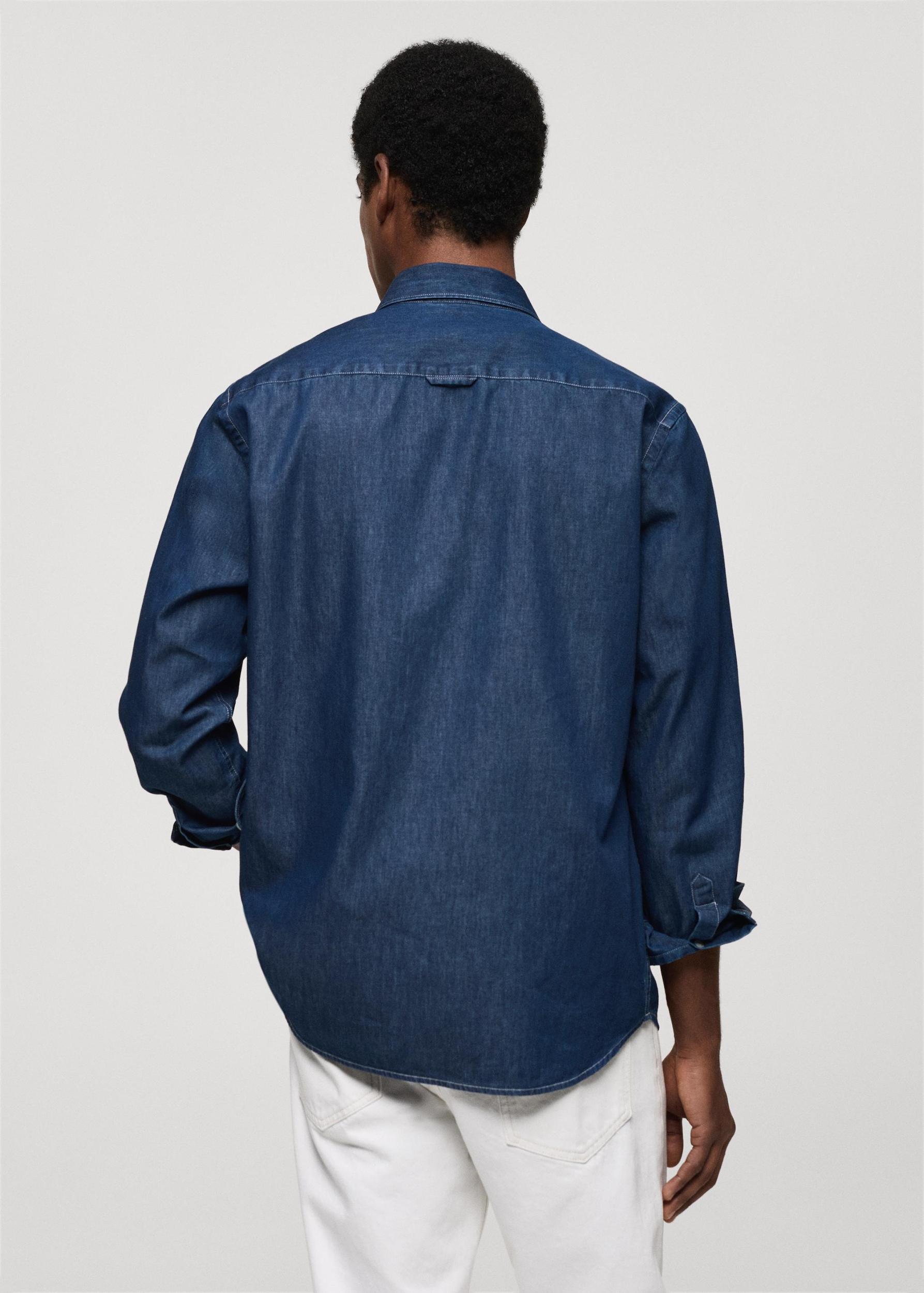 Regular-fit chambray cotton shirt - Men | MANGO USA Product Image