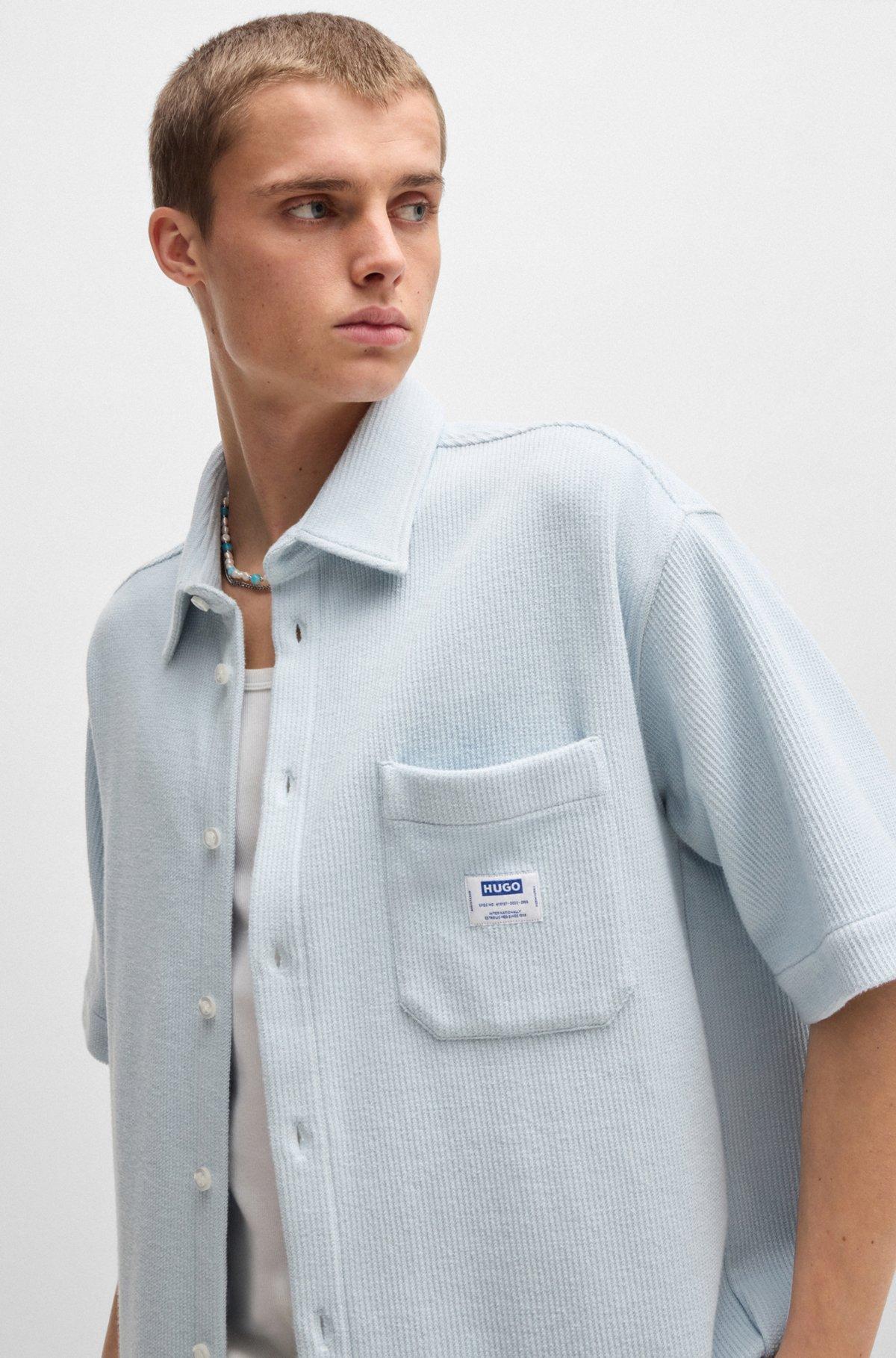 Short-sleeved shirt in waffle-structured cotton Product Image