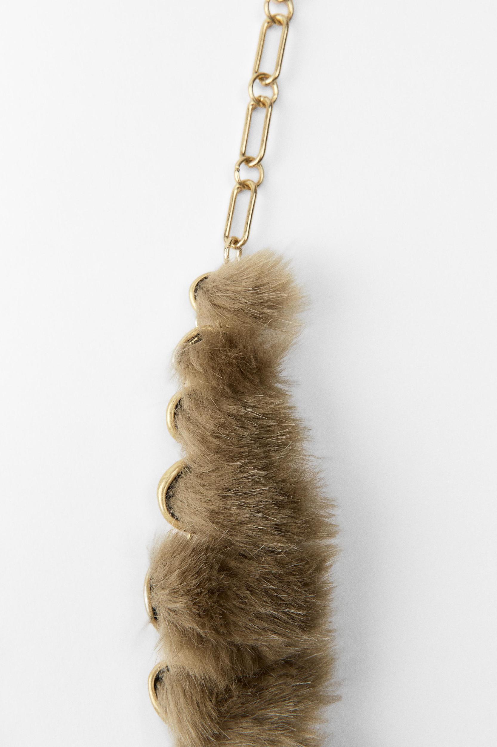 FAUX FUR BELT WITH CHAIN DETAIL LIMITED EDITION Product Image
