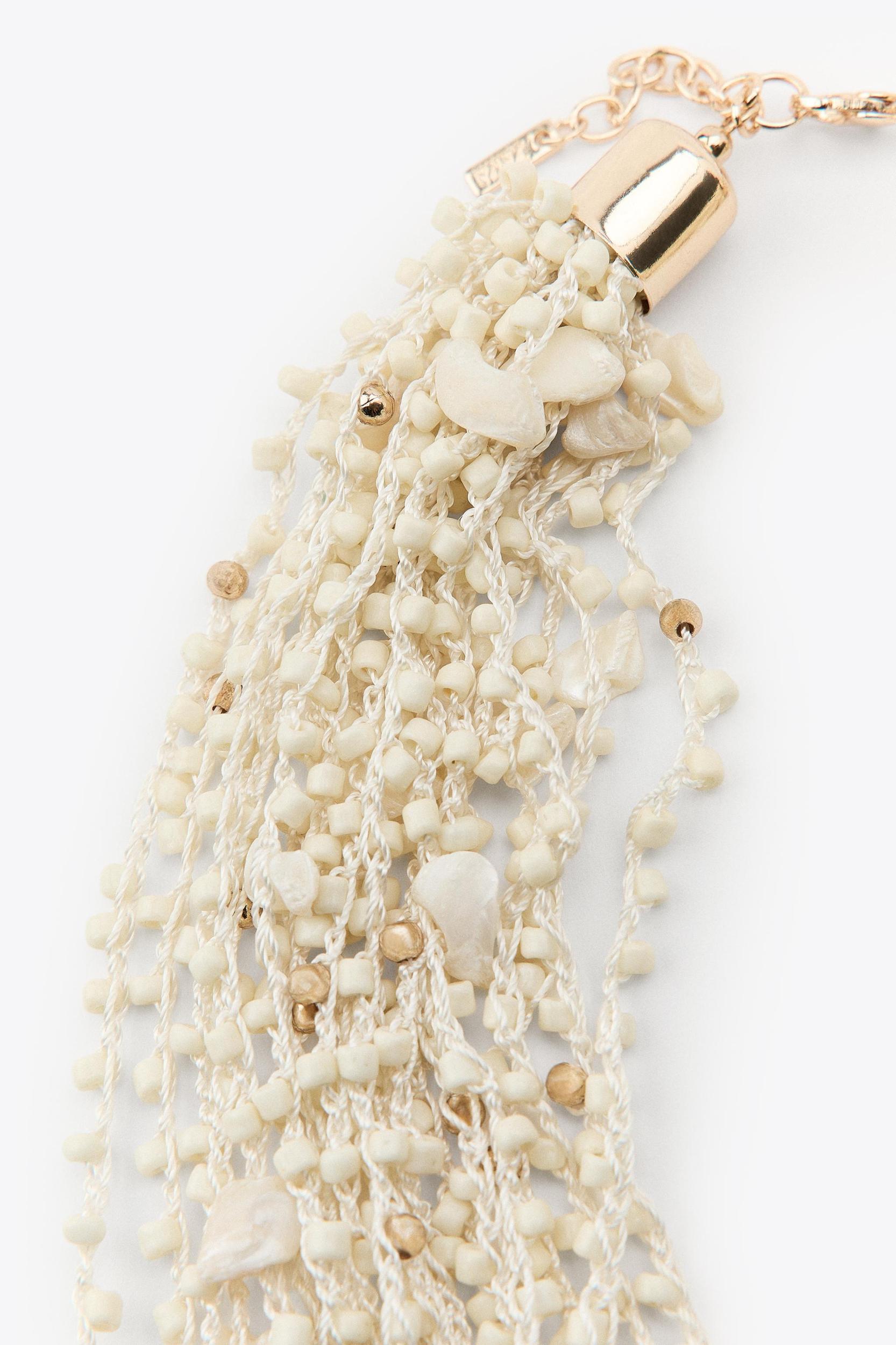 BEADED SHELL BIB NECKLACE Product Image