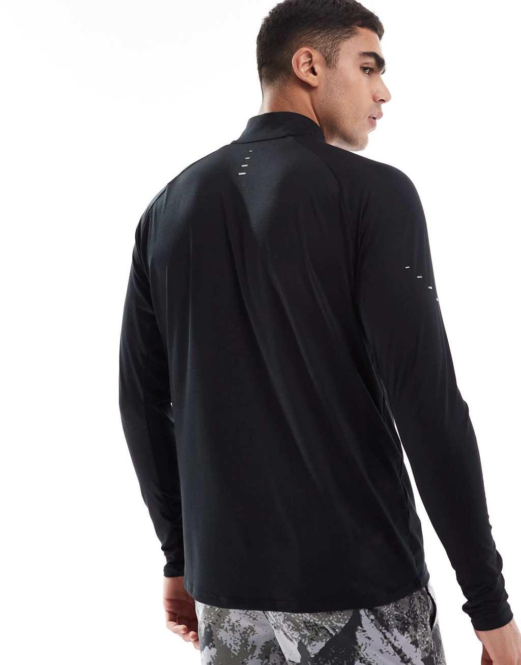 Nike Running Stride half zip sweatshirt in black Product Image