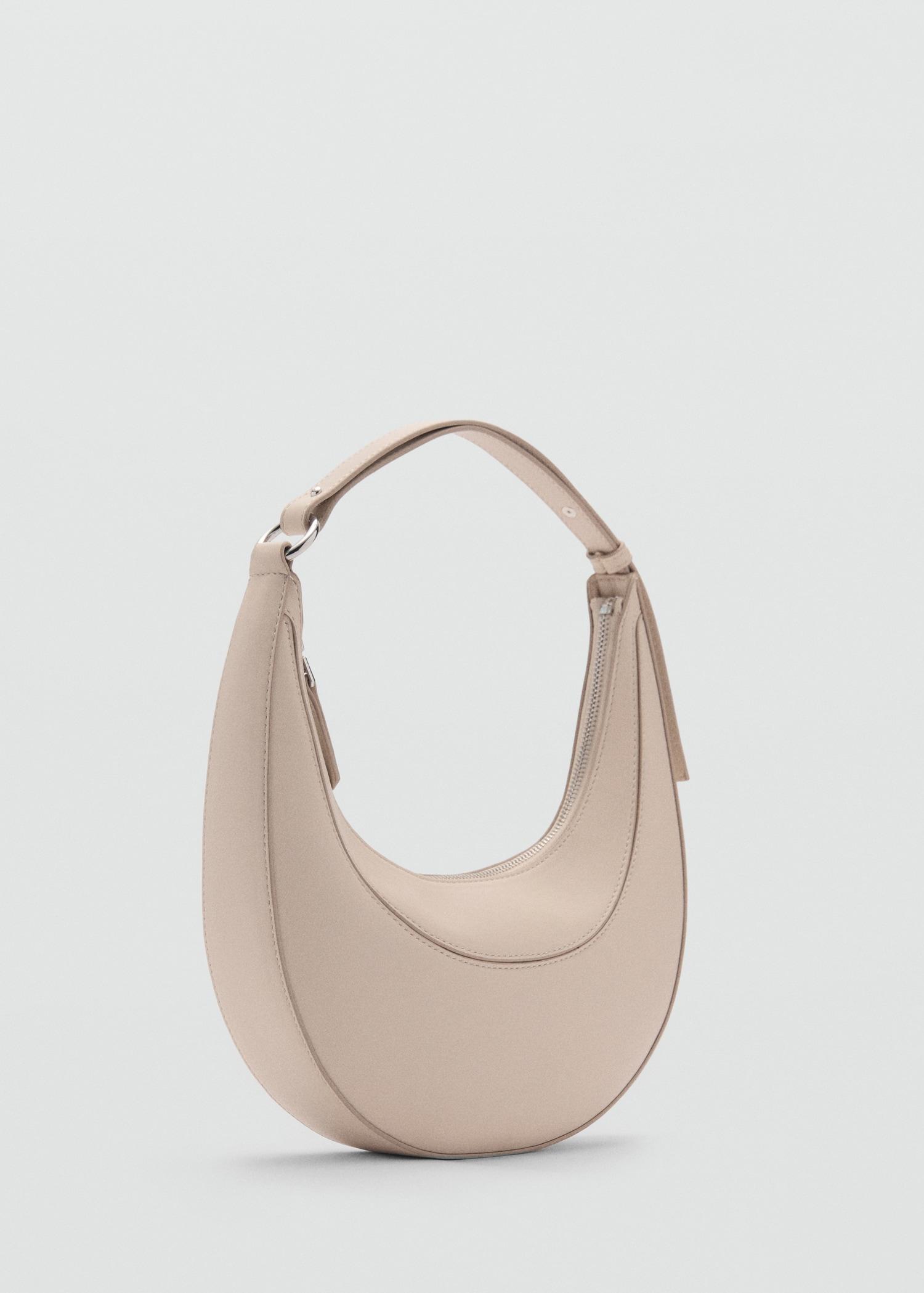 Oval shoulder bag - Women | MANGO USA Product Image