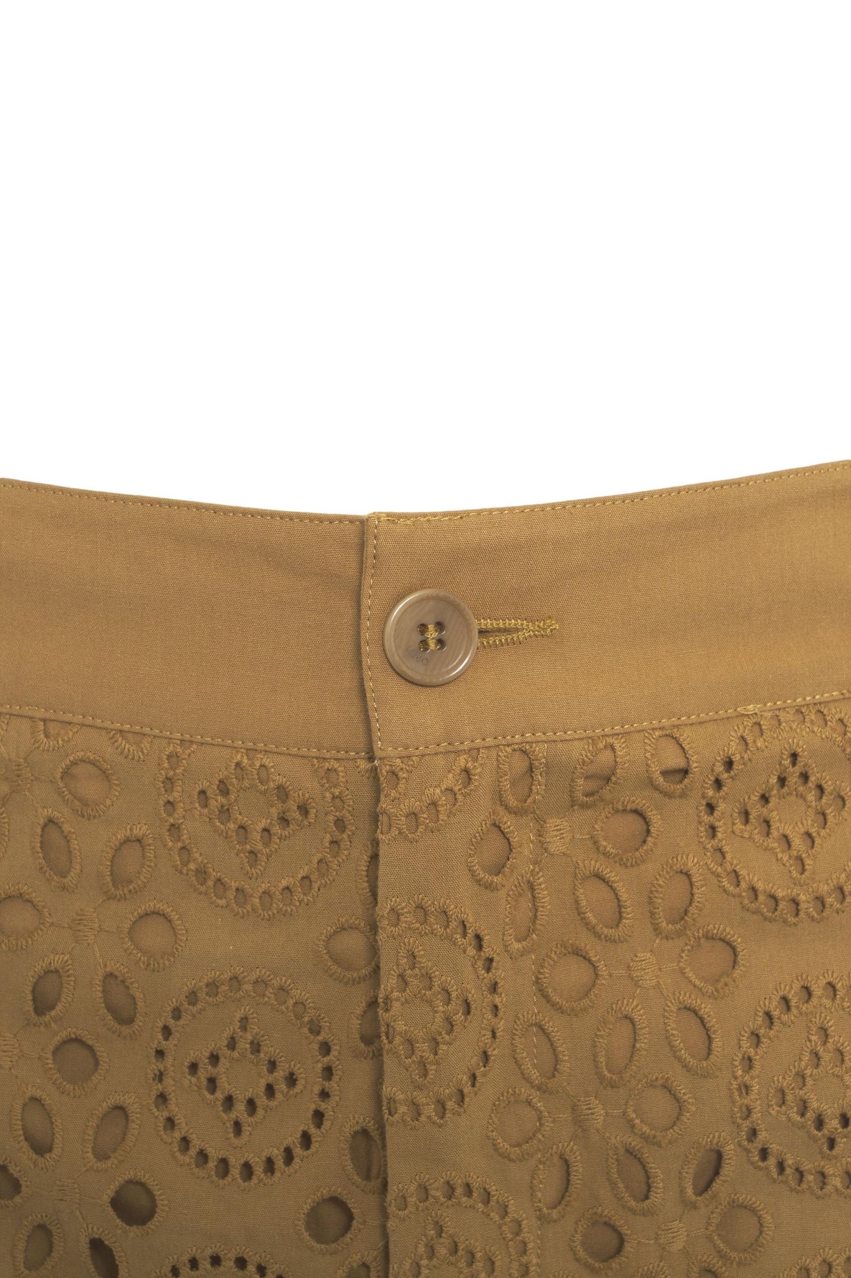 Pants with perforated embroidery Product Image