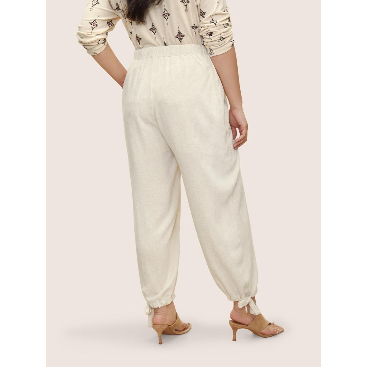 Plus Size Solid Elastic Waist Ties Harem Pants Women Beige Casual Loose High Rise Everyday Pants BloomChic 10/M Product Image