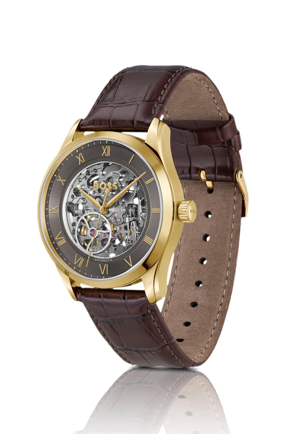 BOSS - Gold-tone automatic watch with skeleton dial Product Image