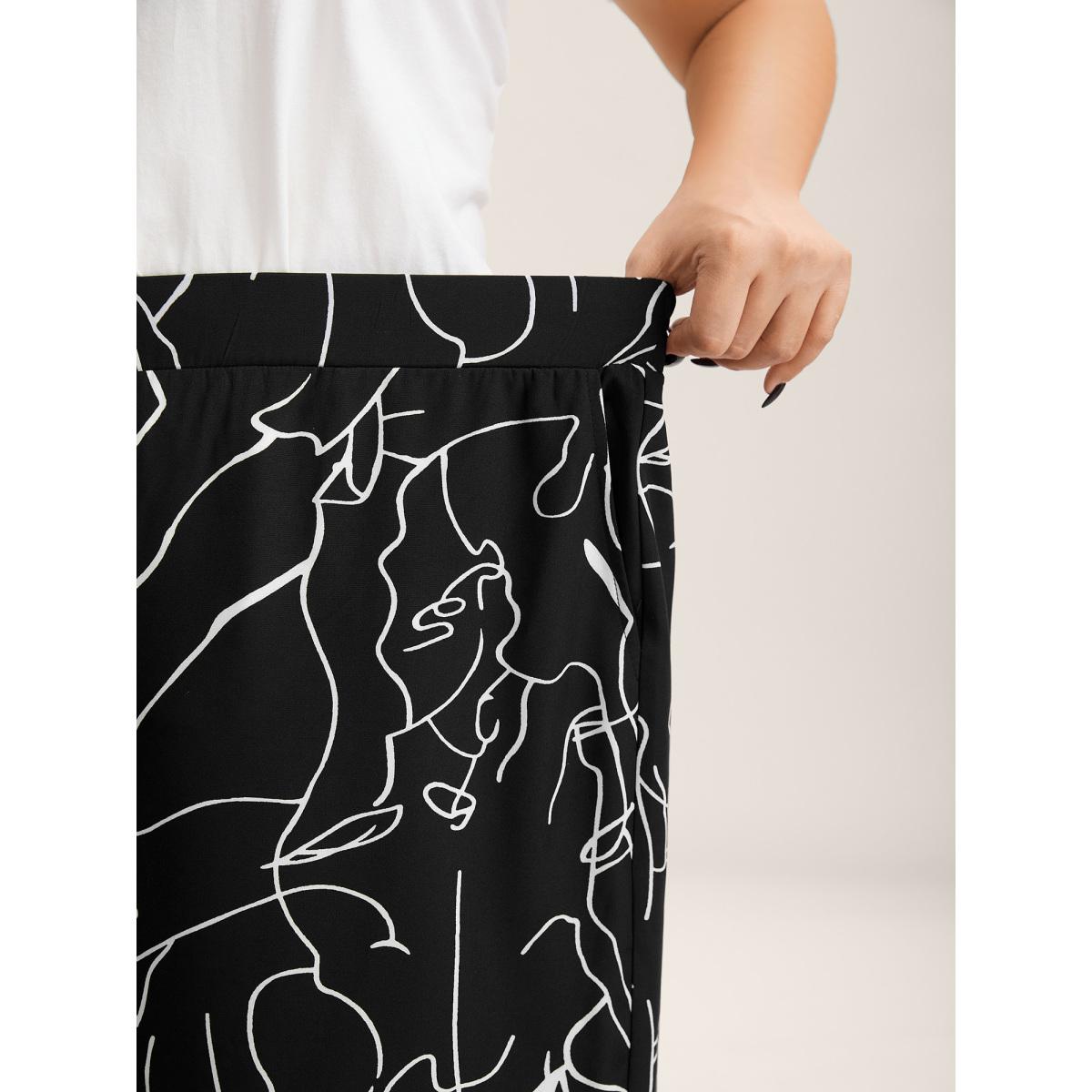 Plus Size Abstract Print Flowy Wide-Leg Pants Women Black Office Wide Leg Mid Rise Office Pants BloomChic 12/L Product Image
