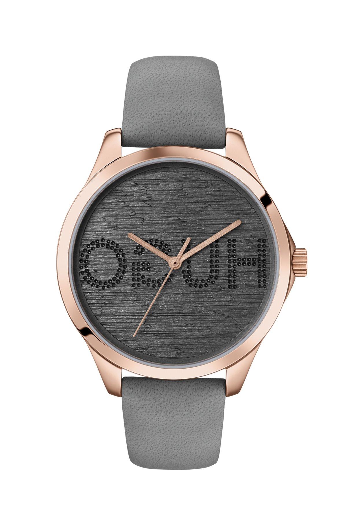 Carnation-gold-effect watch with reverse-logo dial Product Image