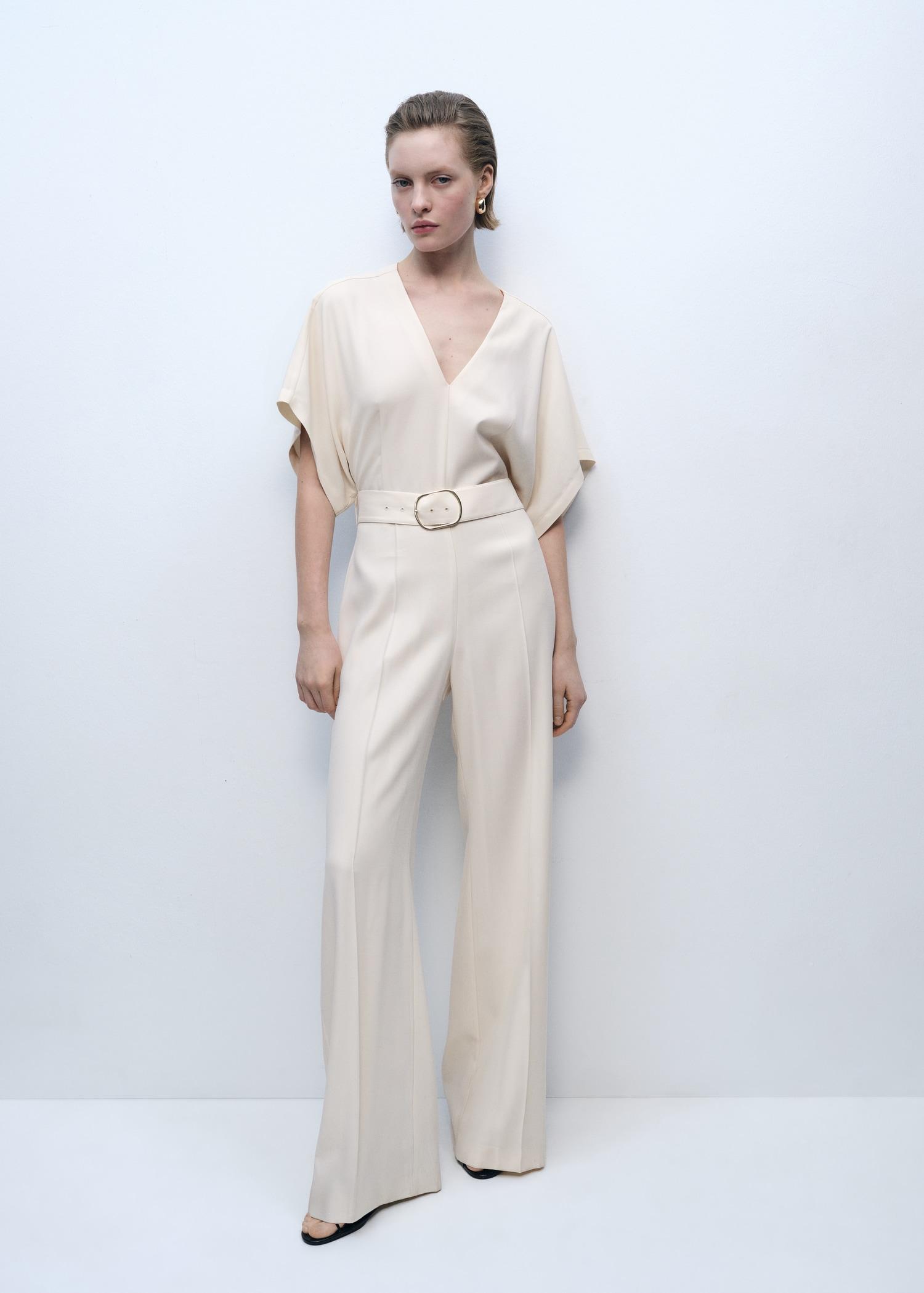 Long jumpsuit with belt and buckle - Women | MANGO USA Product Image