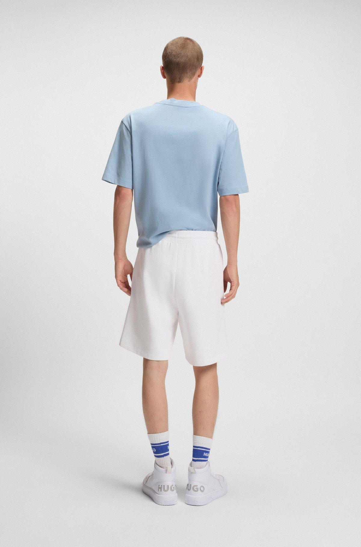 Cotton-terry shorts with Happy HUGO logo Product Image