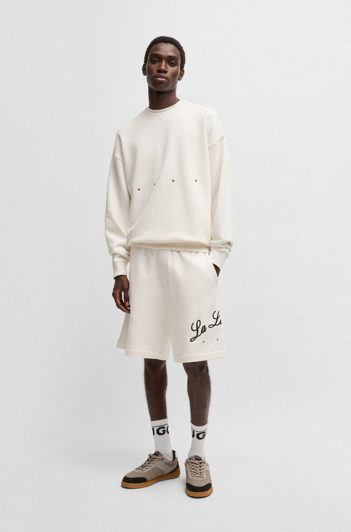 HUGO - Cotton-terry sweatshirt with logo artwork - White Product Image