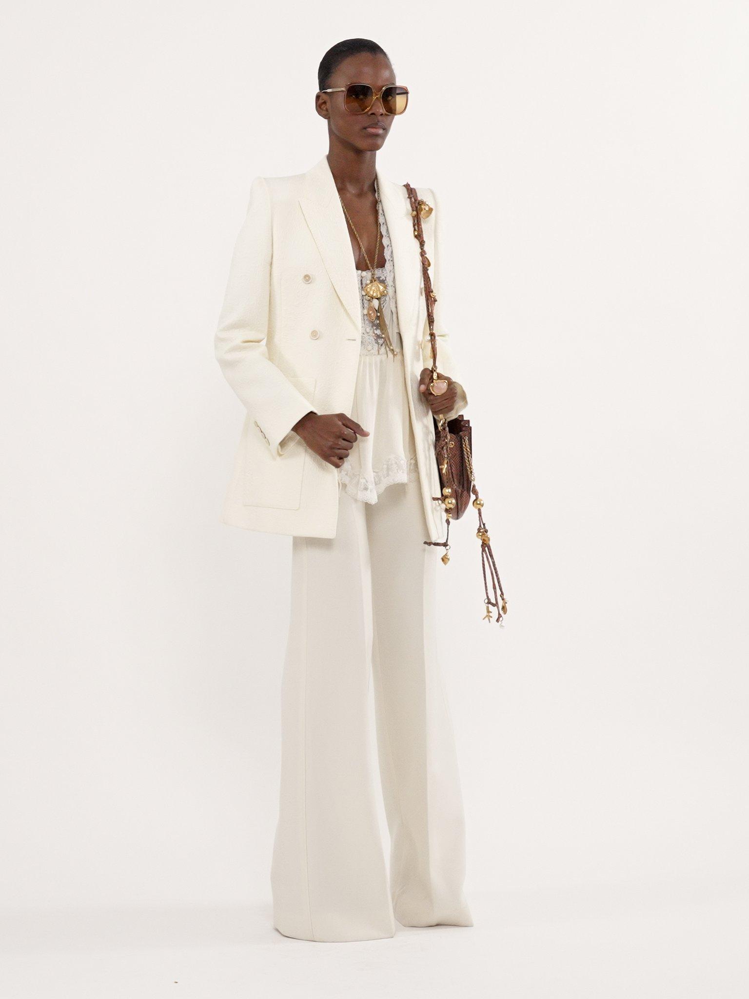 High-rise flared pants in wool grain de poudre Product Image