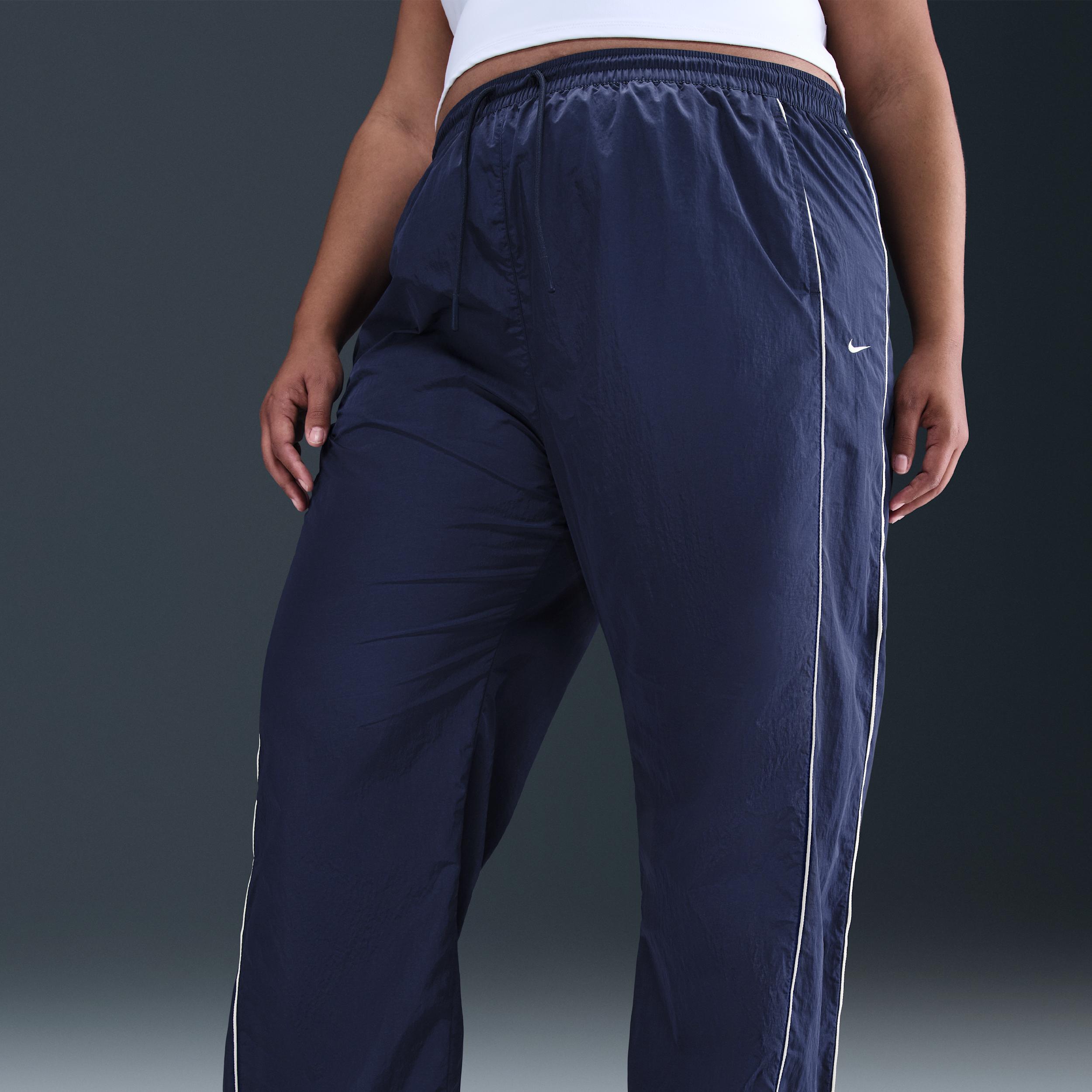 Nike Womens Windrunner High-Waisted Woven Open-Hem Pants (Plus Size) | FV7657-410 Product Image