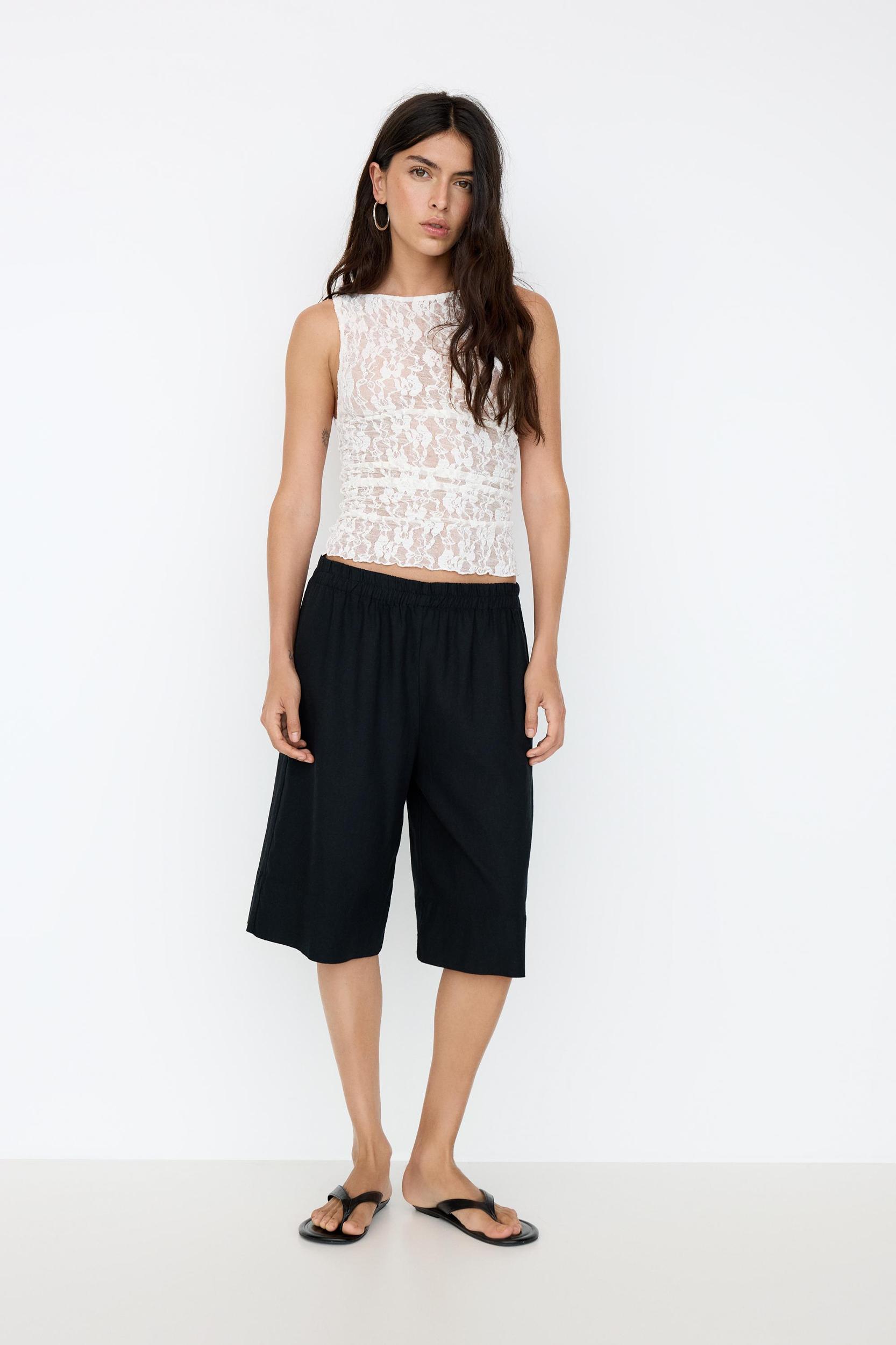 Lace top with gathered sides Product Image