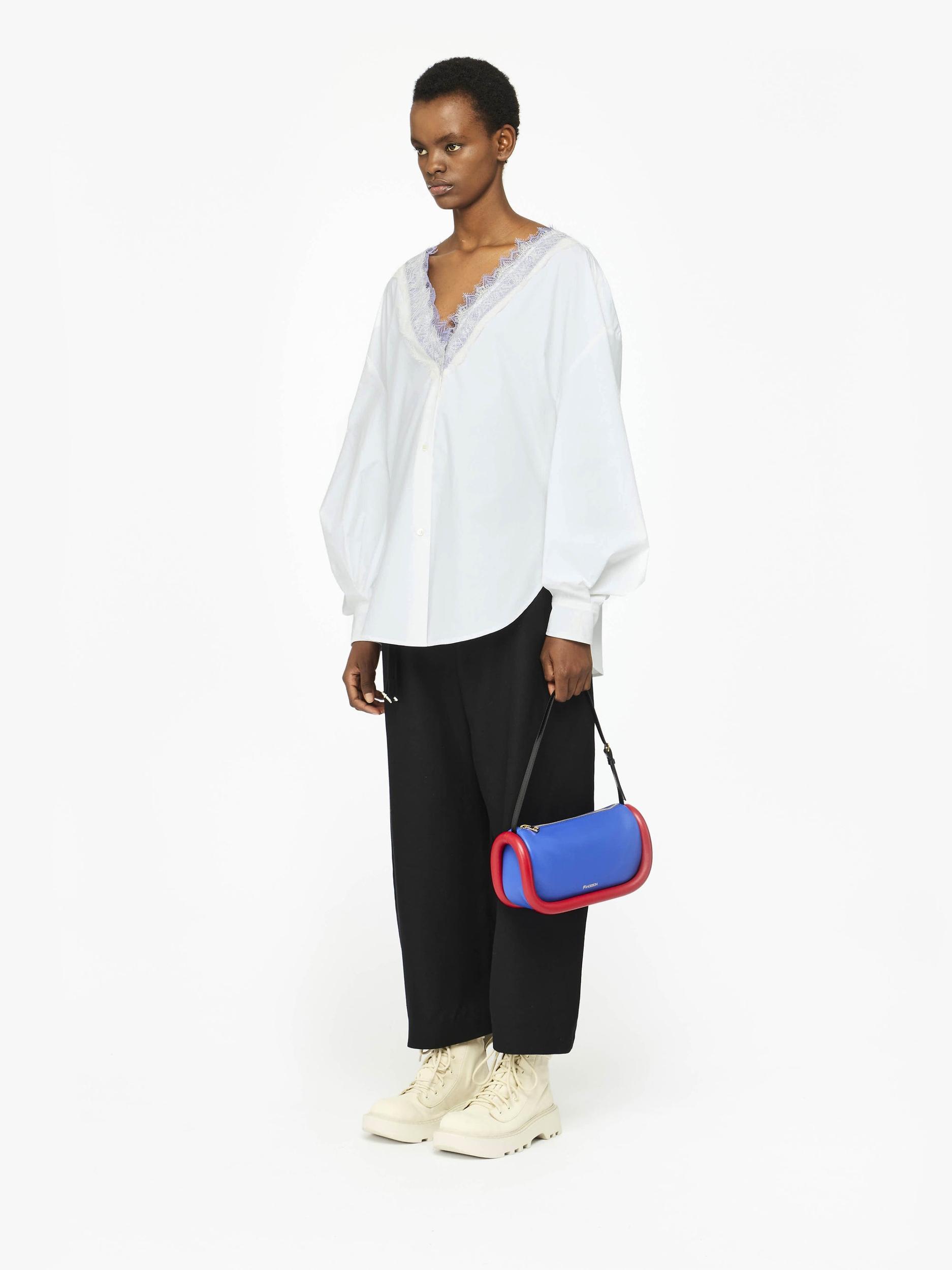 V-NECK LACE TRIM SHIRT Product Image