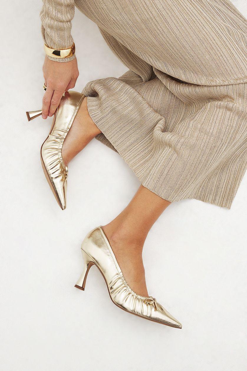 Gold Bow Detail Pumps Product Image