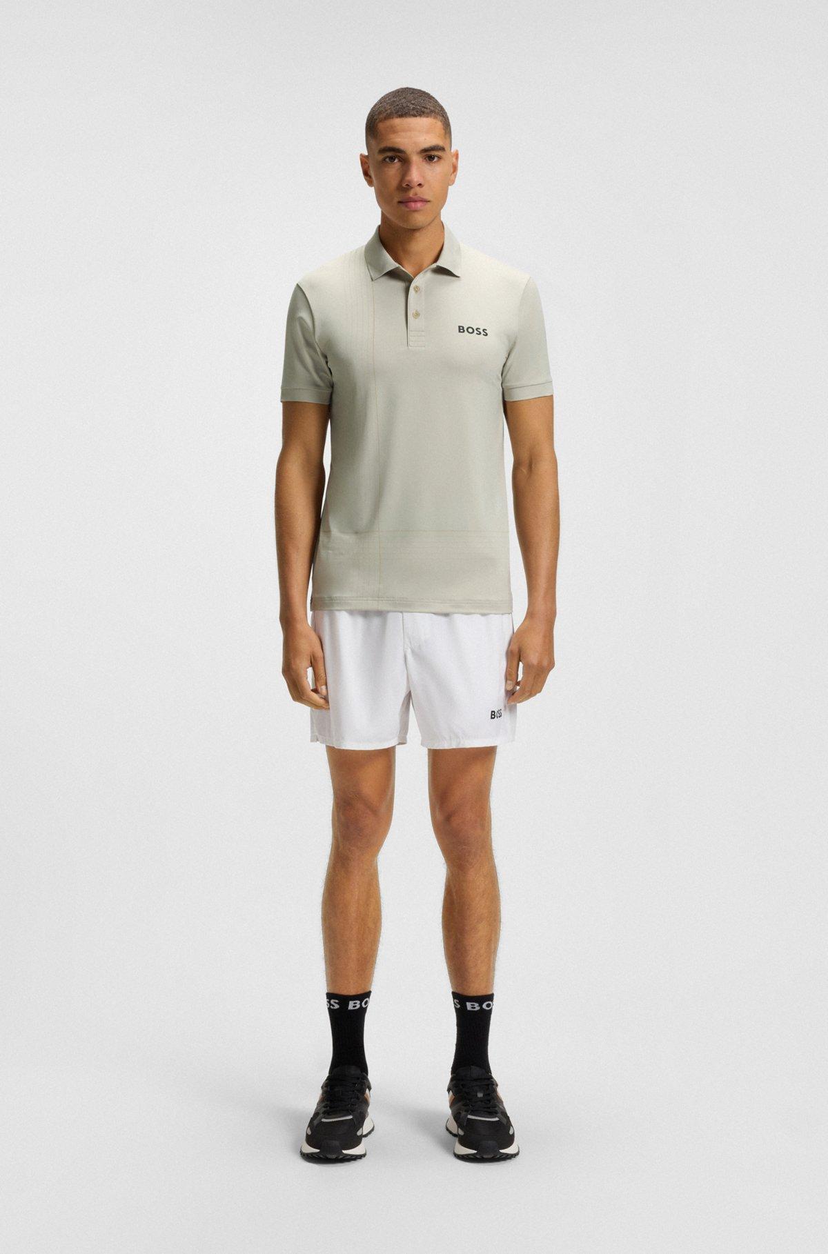 Active quick-dry polo shirt with check artwork Product Image