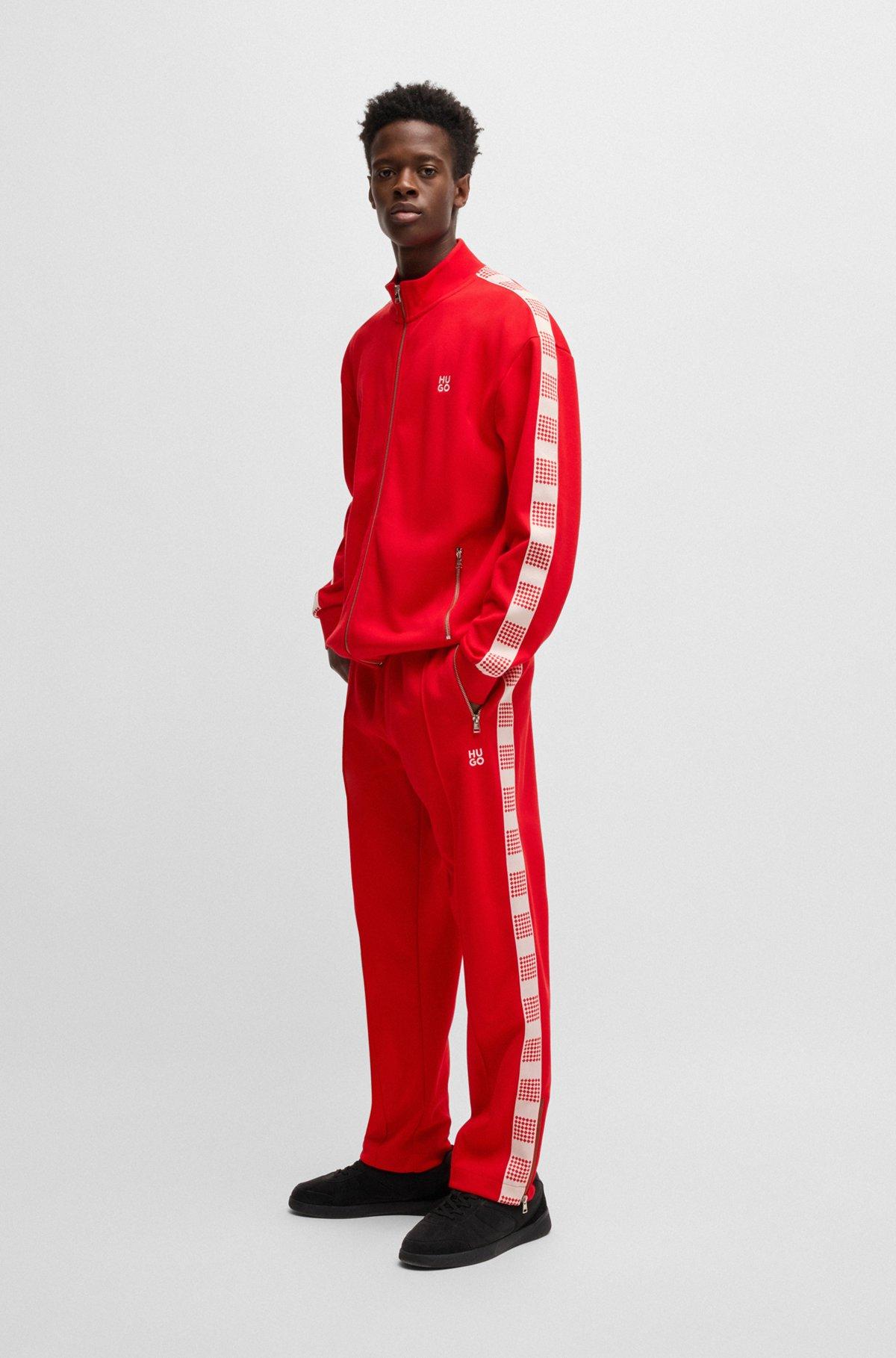 HUGO - Tracksuit bottoms with checked tape - light pink Product Image