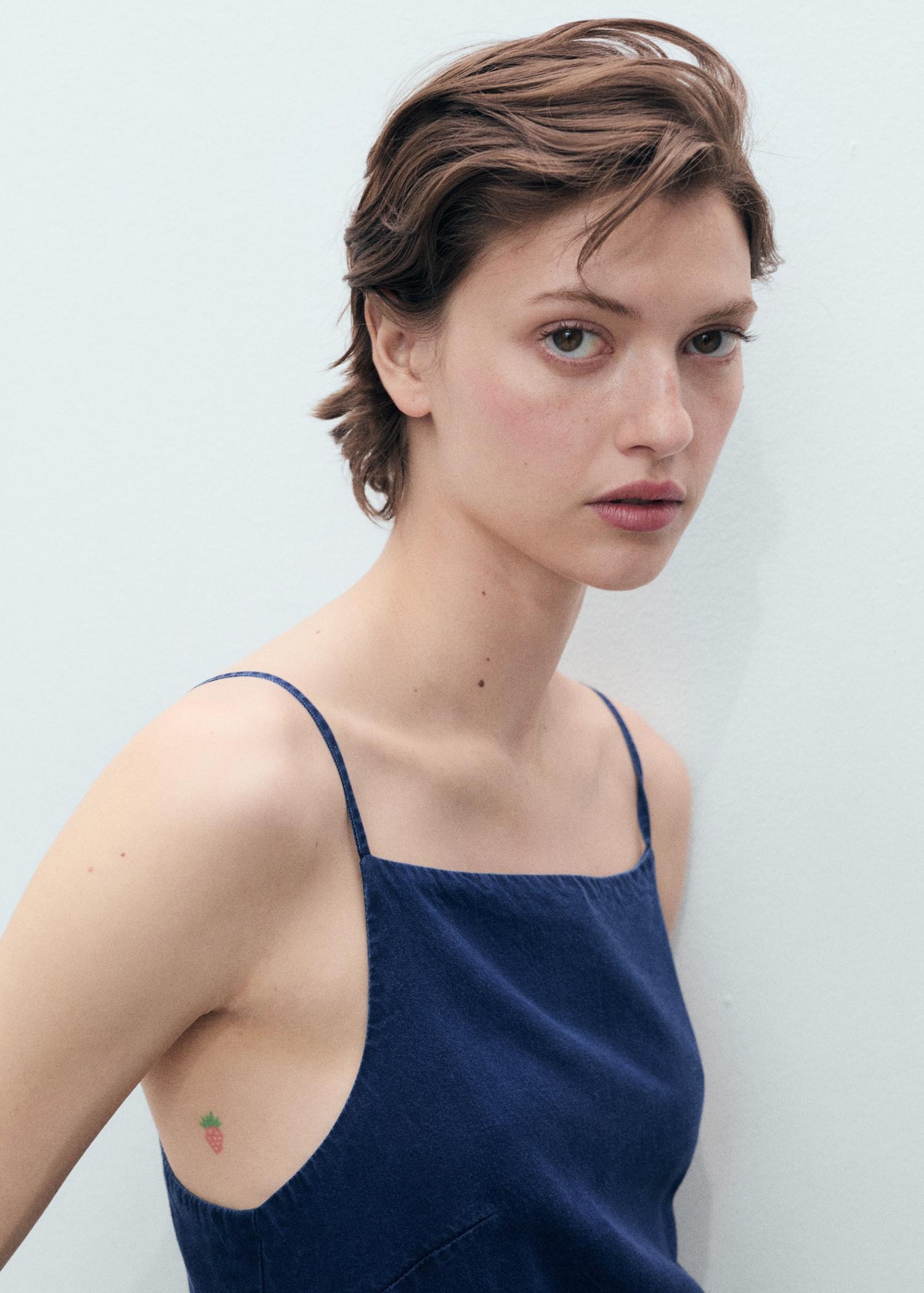 Long denim-effect jumpsuit - Women | MANGO USA Product Image