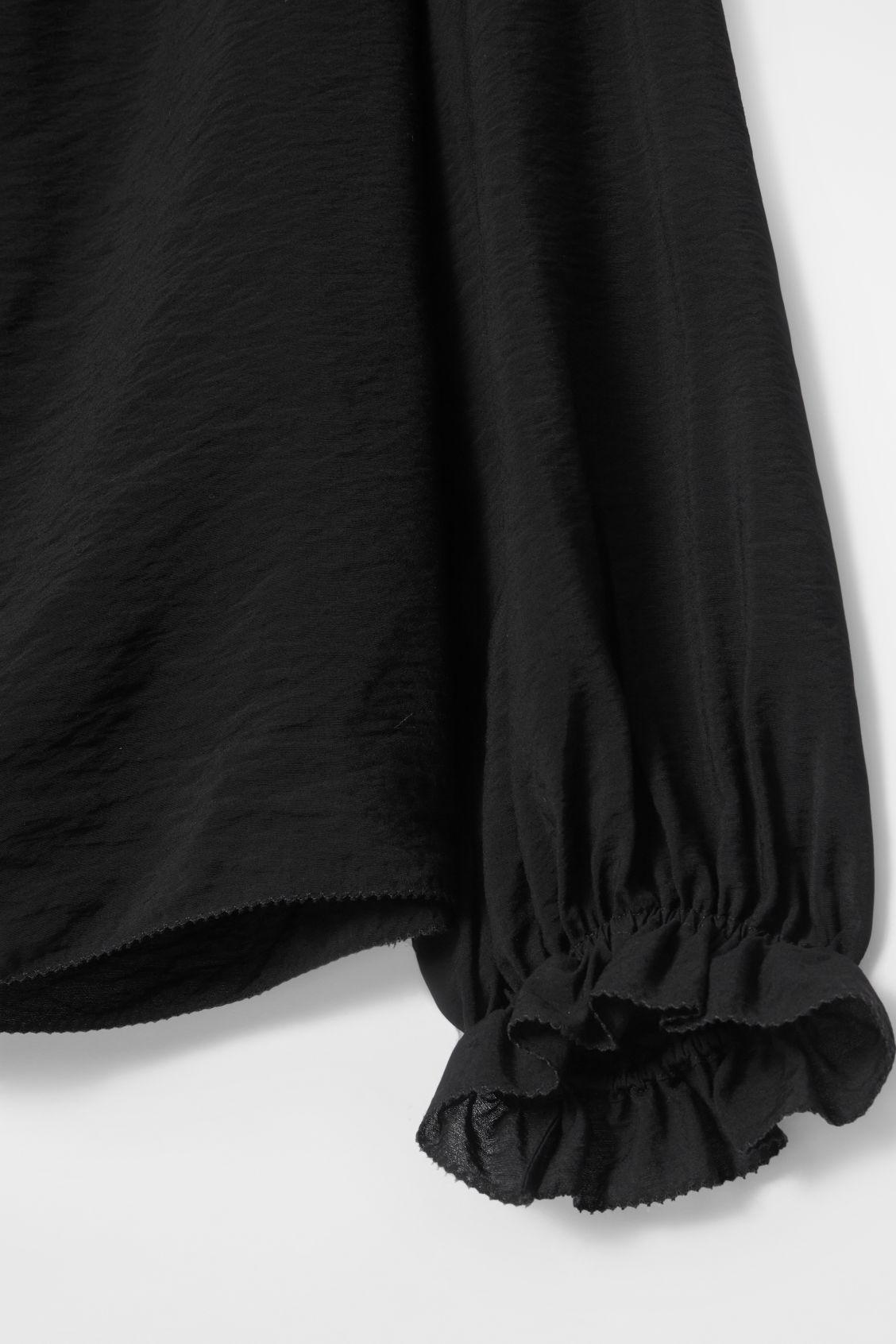 RUFFLED HIGH-NECK BLOUSE Product Image