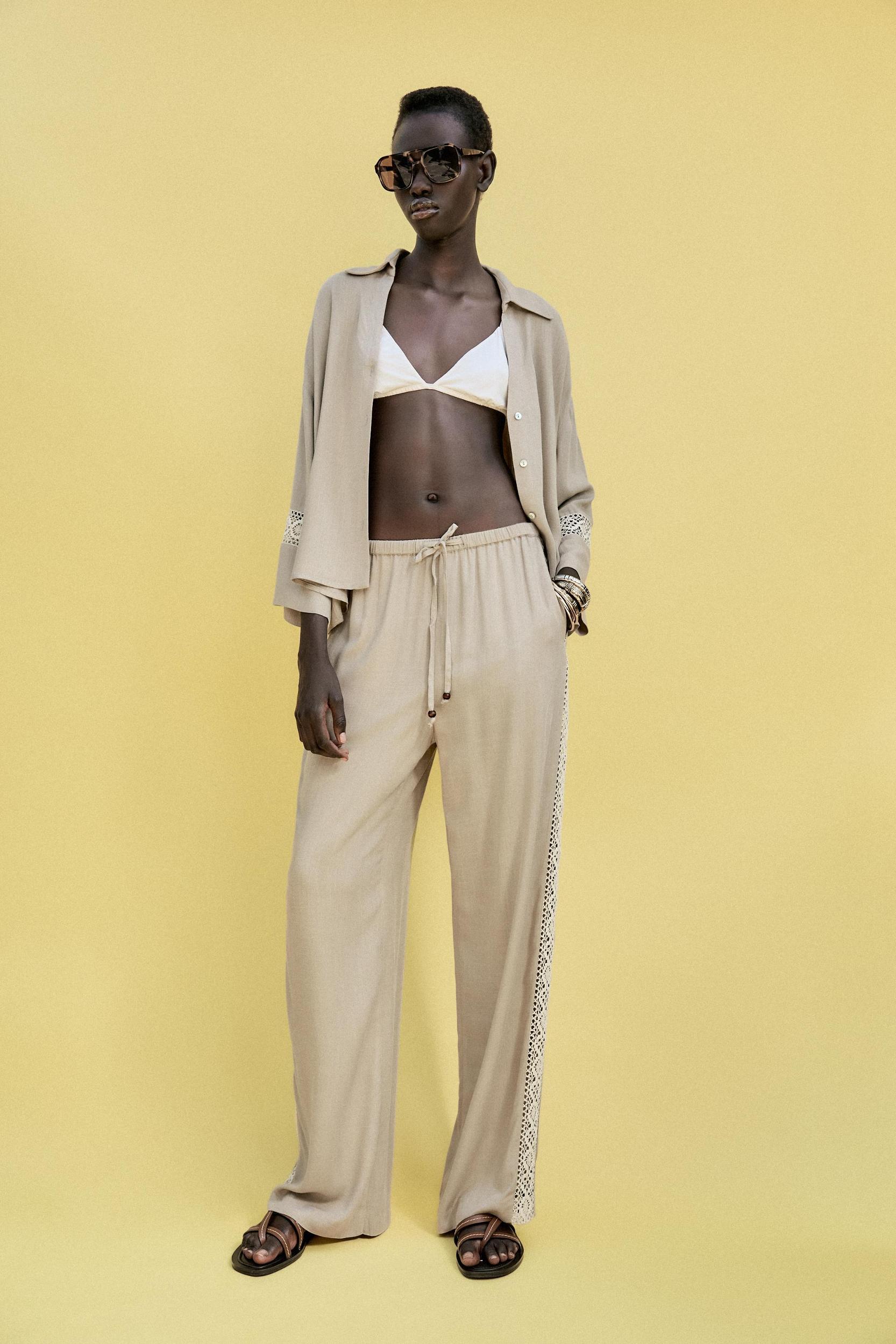 WIDE LEG PANTS WITH EMBROIDERED SIDE STRIPES Product Image