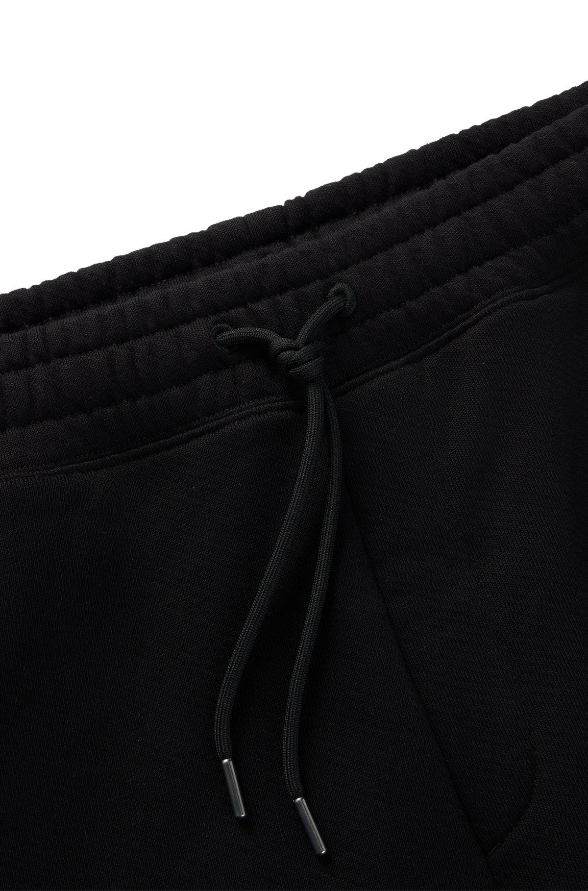 Loose-fit shorts in cotton terry with logo print Product Image