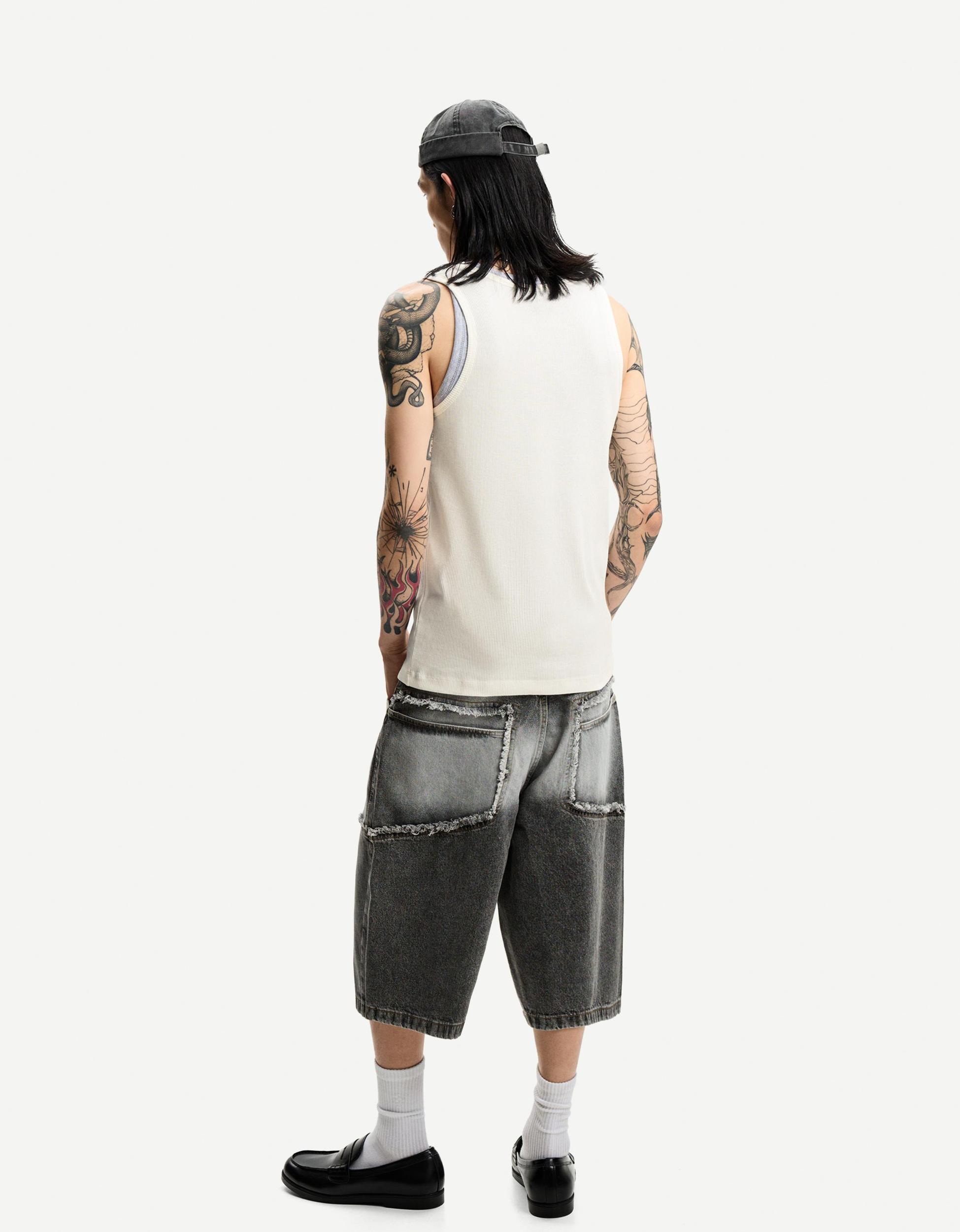 Baggy denim Bermuda shorts with fringing Product Image