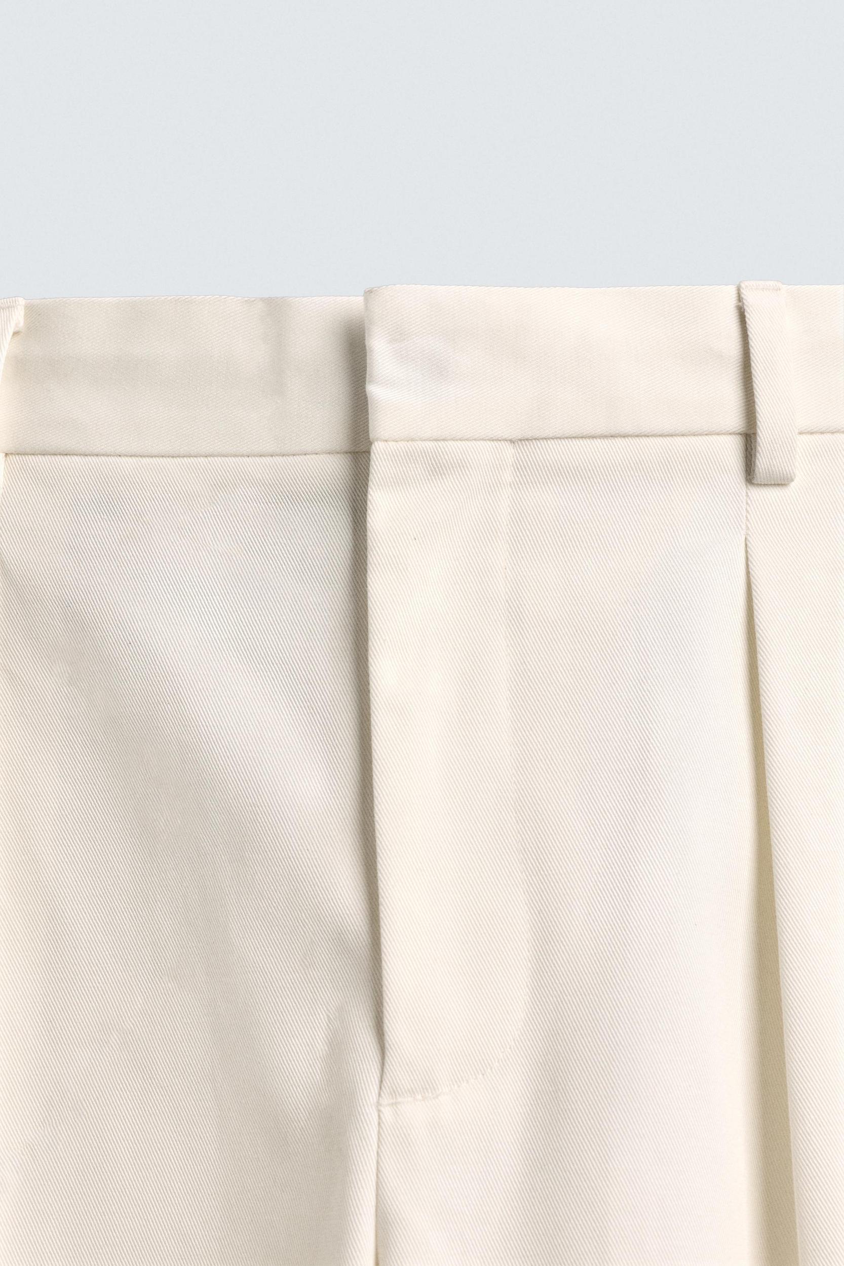 PLEATED CHINO PANTS AARON LEVINE X ZARA Product Image