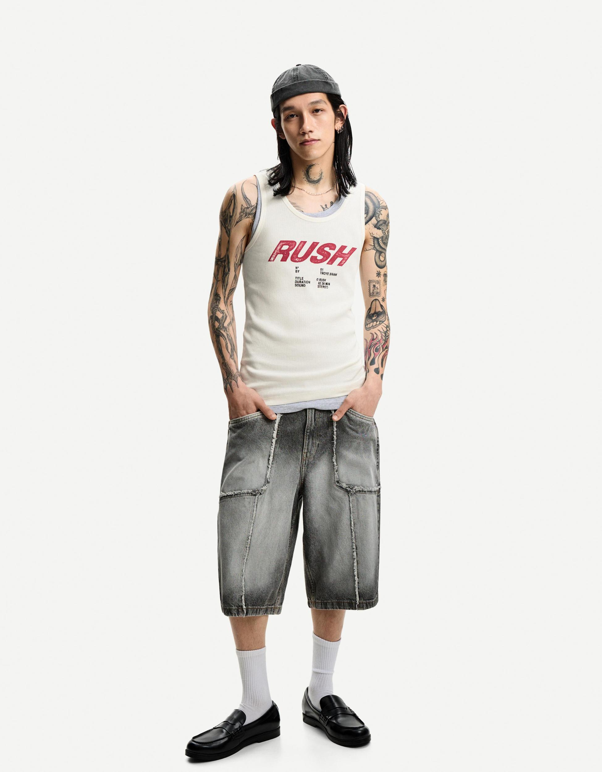 Baggy denim Bermuda shorts with fringing Product Image