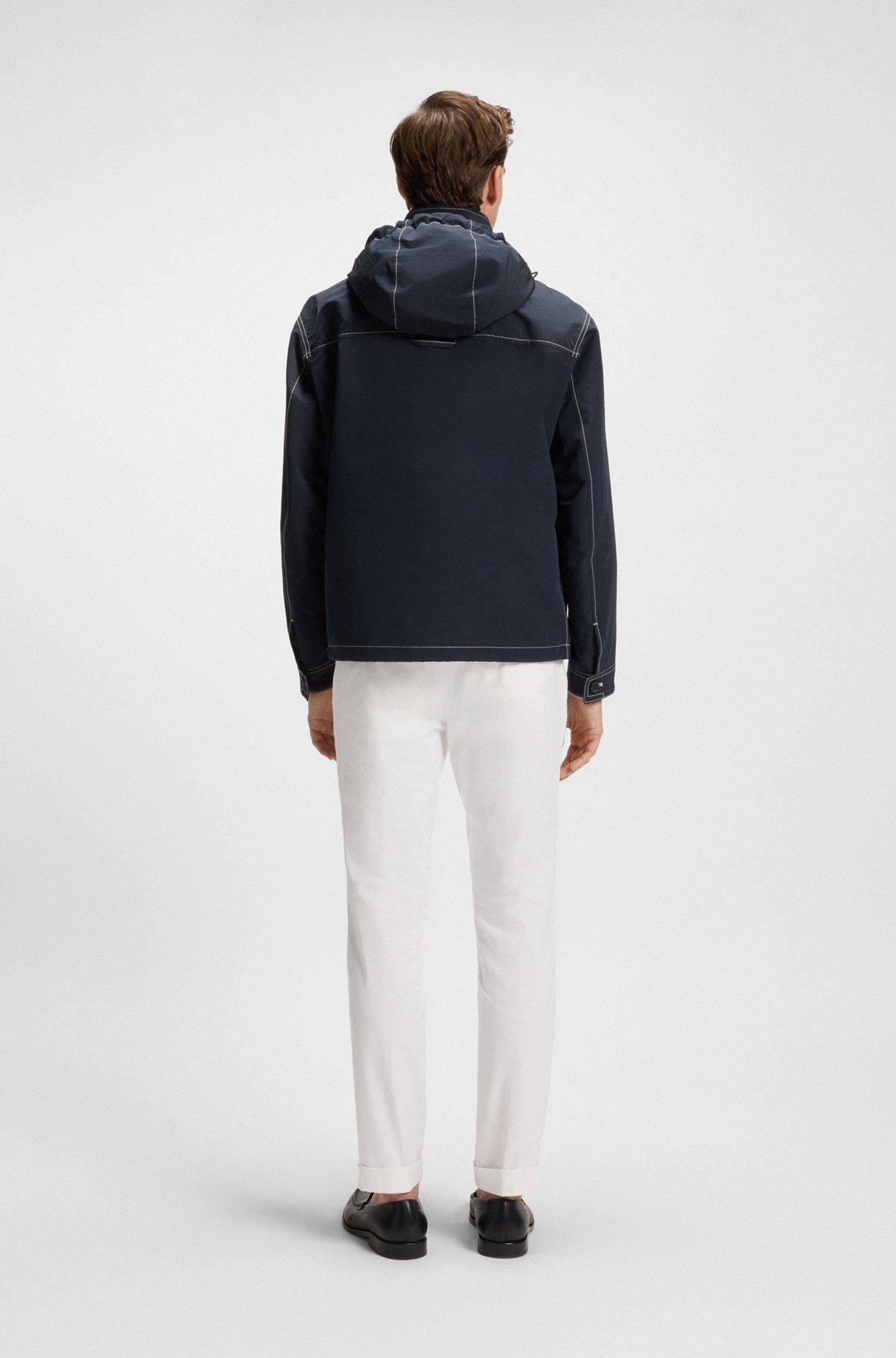 Packable hooded jacket in water-repellent mixed fabrics Product Image