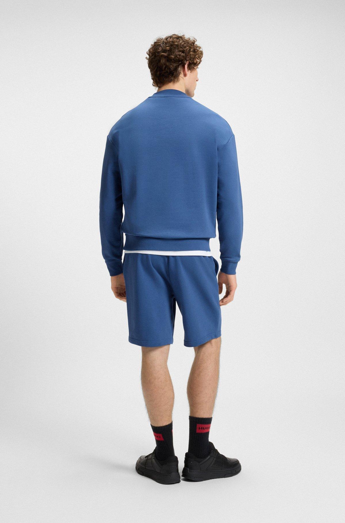 HUGO - Relaxed-fit sweatshirt in cotton terry with sleeve logo - Blue Product Image
