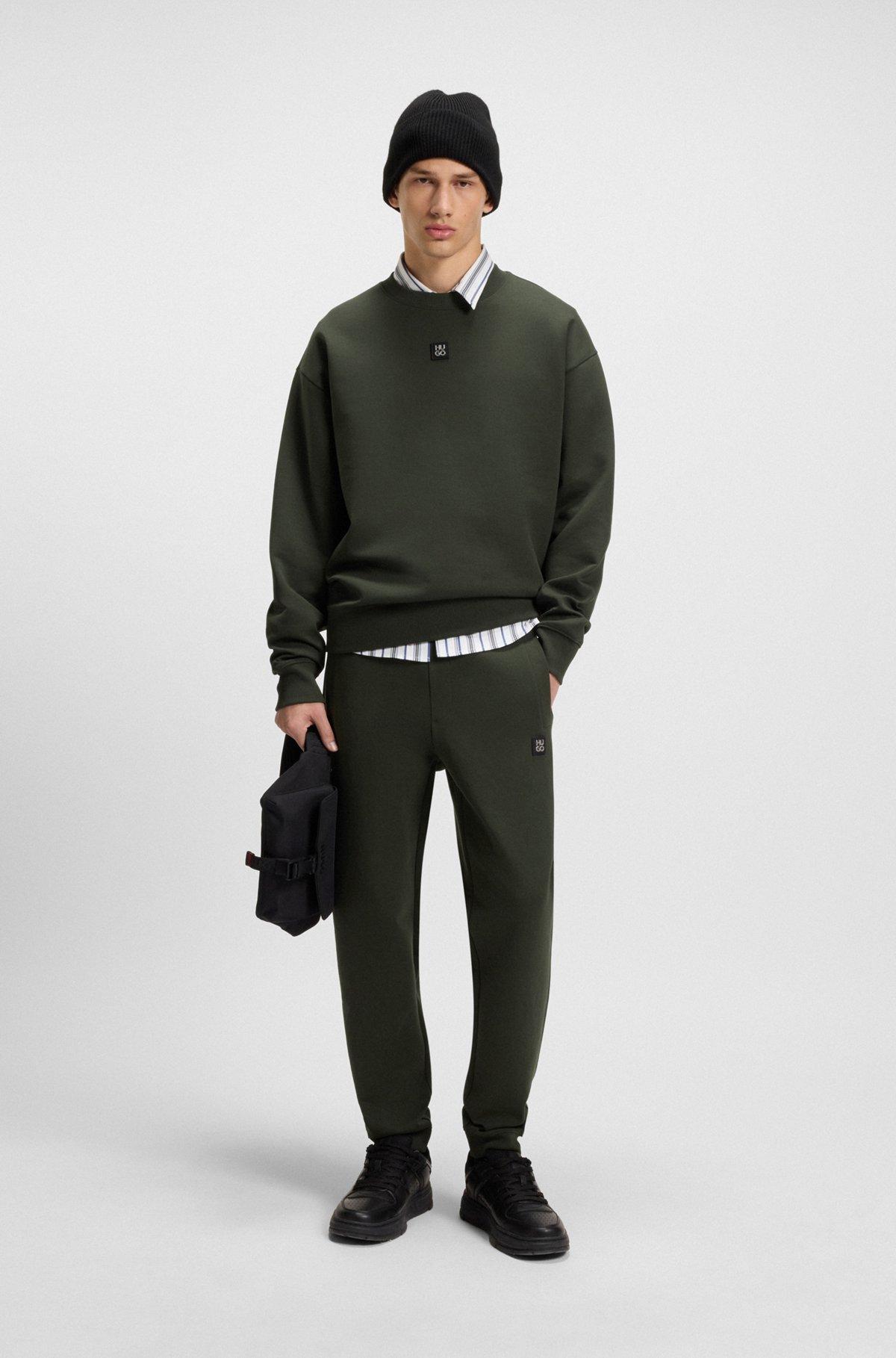 HUGO - Cotton tracksuit bottoms with stacked logo - Dark Green Product Image