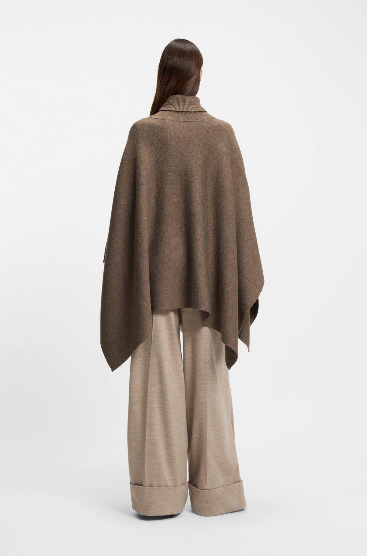 Rollneck poncho in a wool blend Product Image
