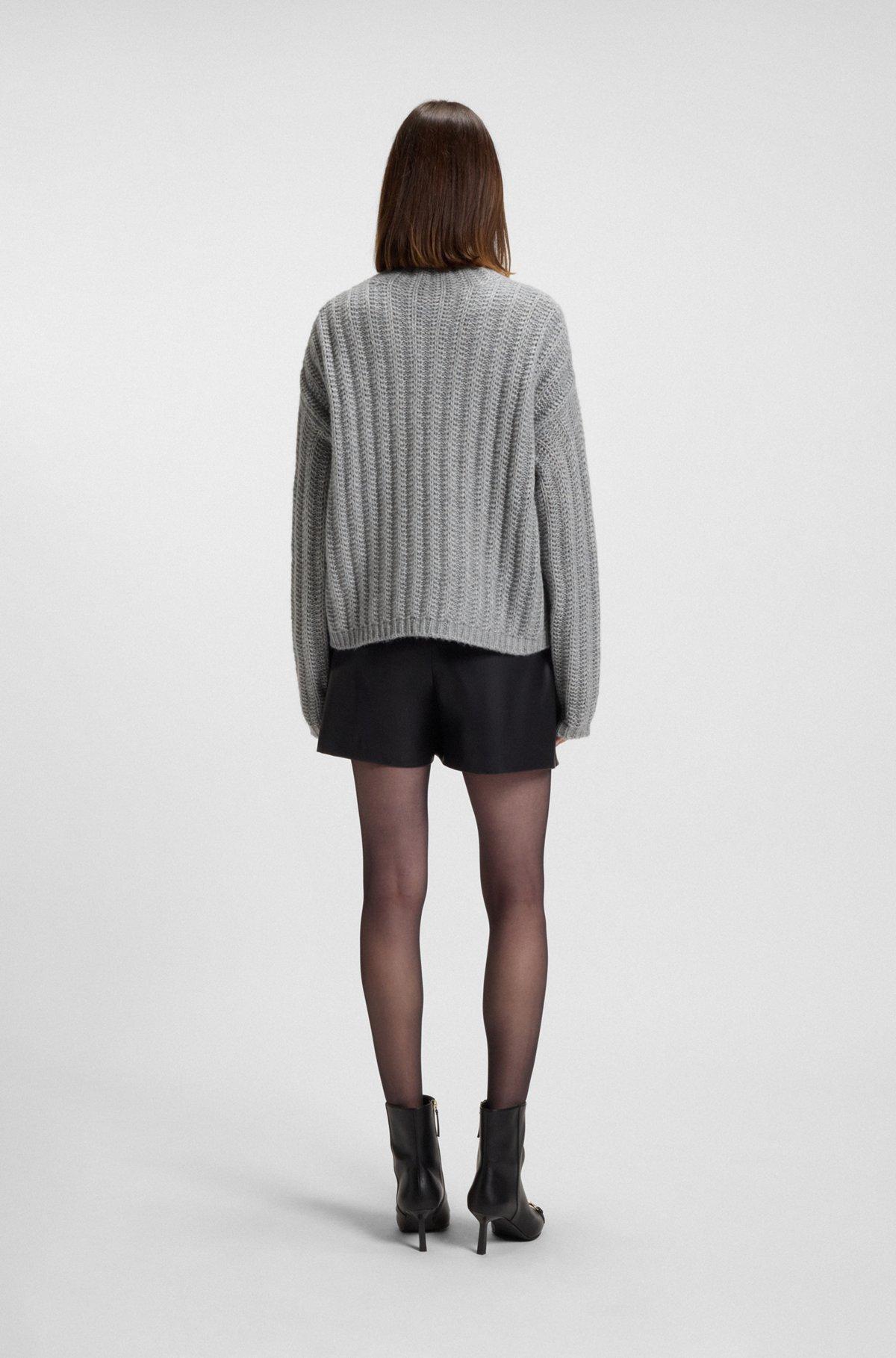 Knitted sweater with ribbed structure Product Image