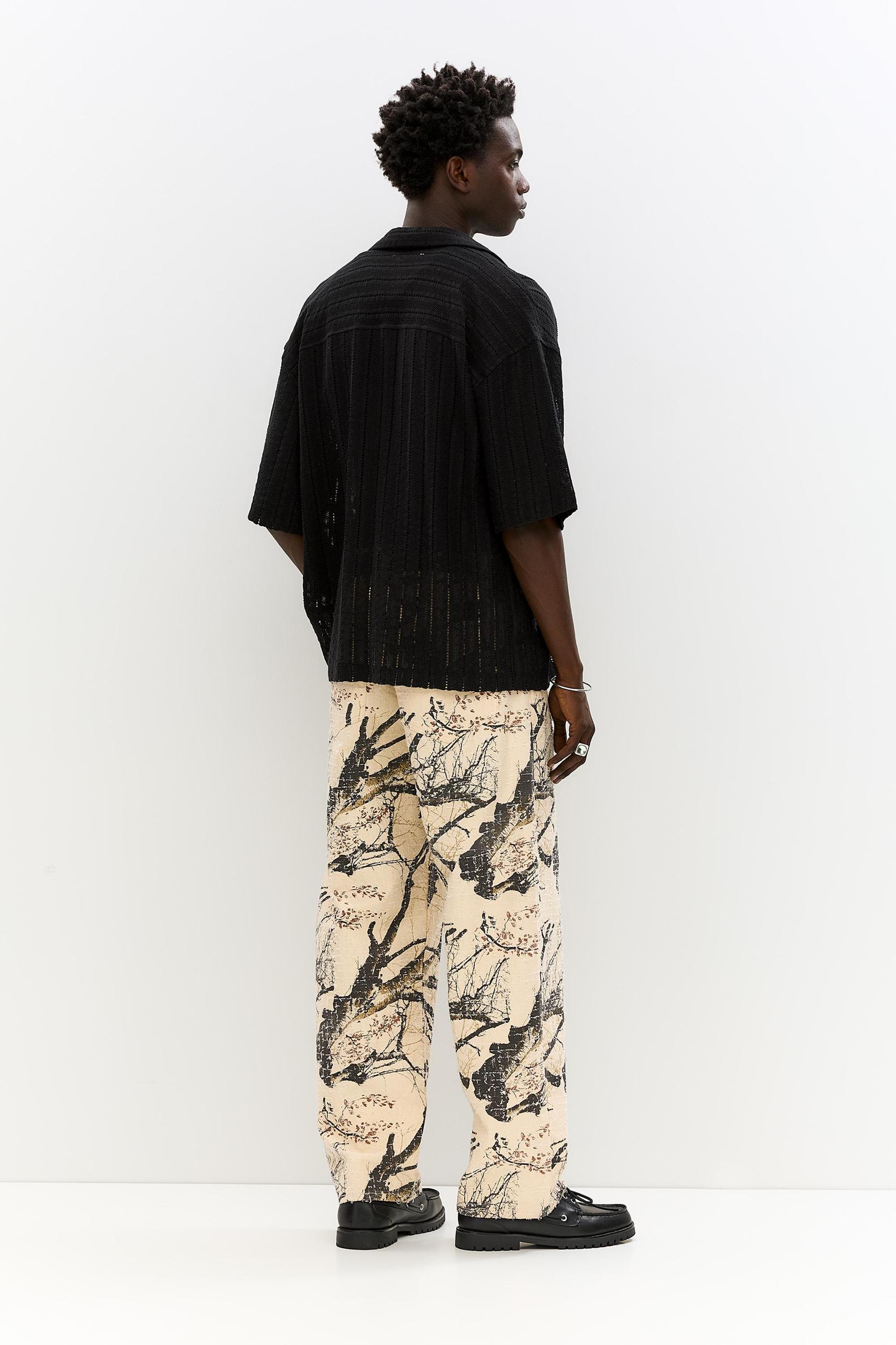 Black textured short sleeve shirt Product Image