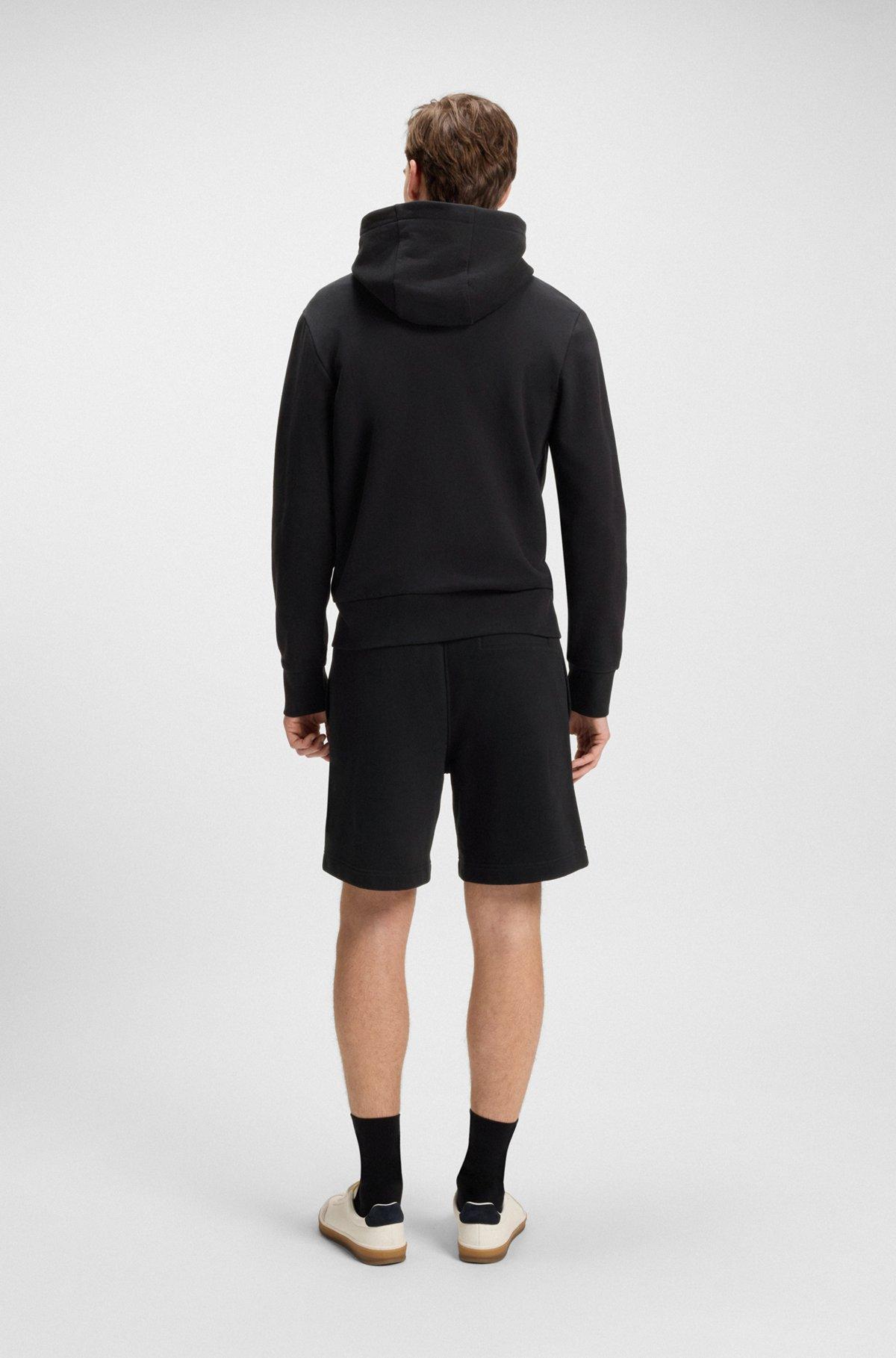 BOSS - BECKHAM x BOSS oversized-fit shorts in cotton terry - Black Product Image