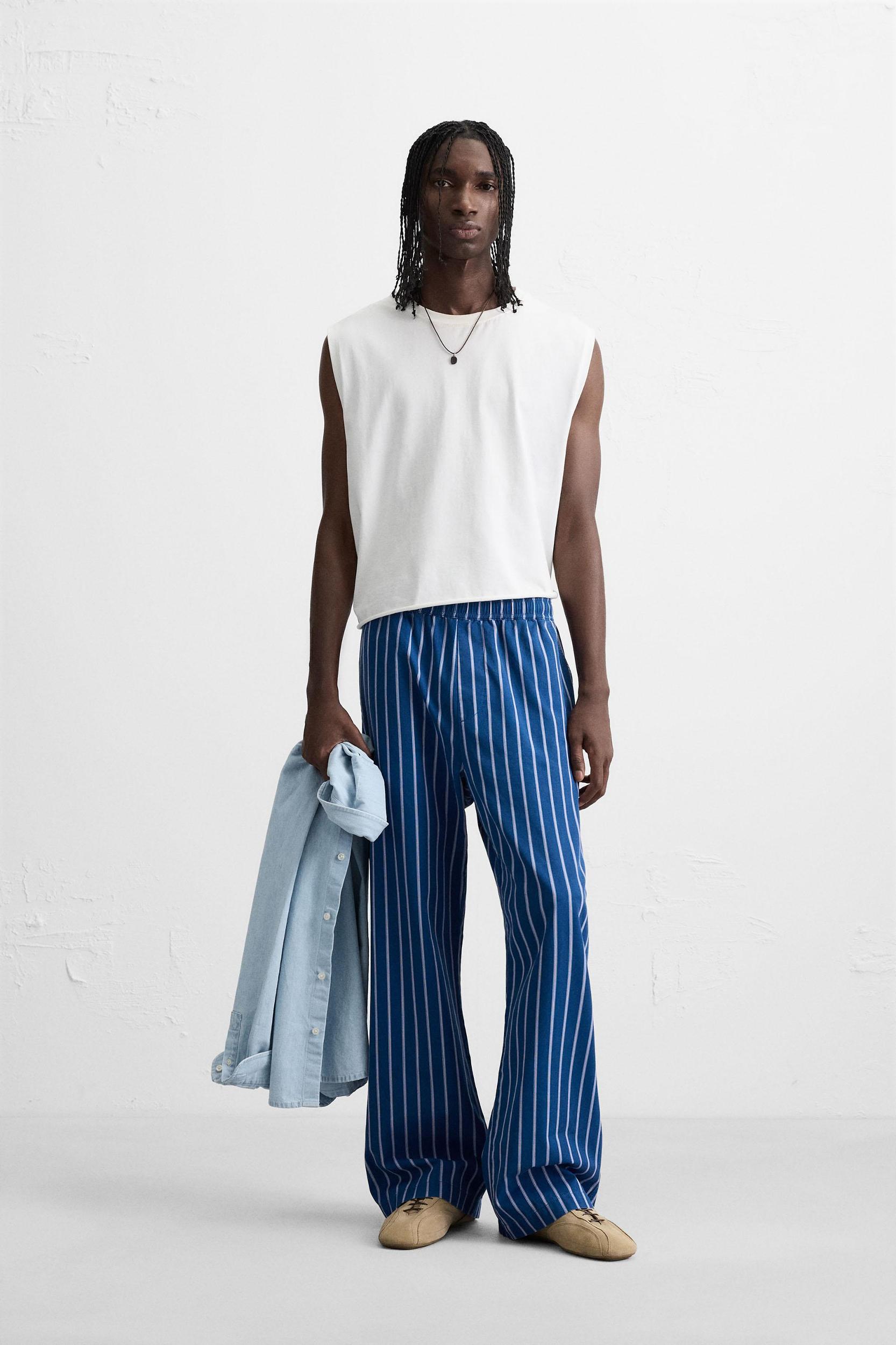 STRIPED RELAXED FIT PANTS Product Image