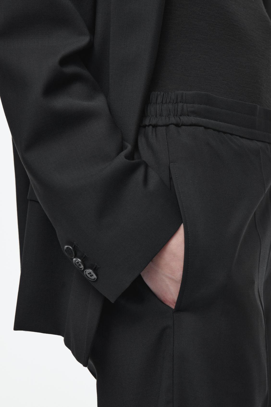 REGULAR ELASTICATED WOOL STRAIGHT-LEG PANTS Product Image