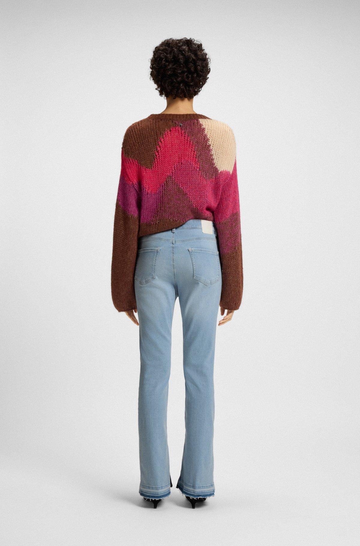 Bootcut jeans in blue stretch denim with slit hems Product Image