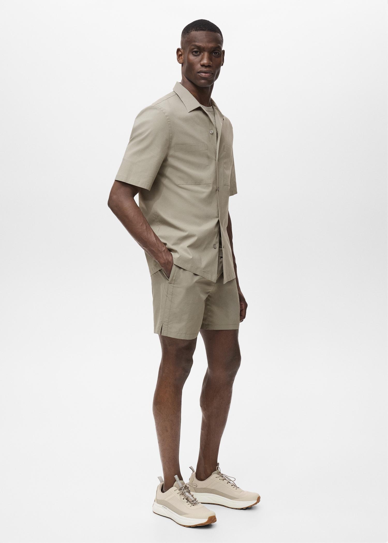 Shirt with pockets and bowling collar - Men | MANGO USA Product Image