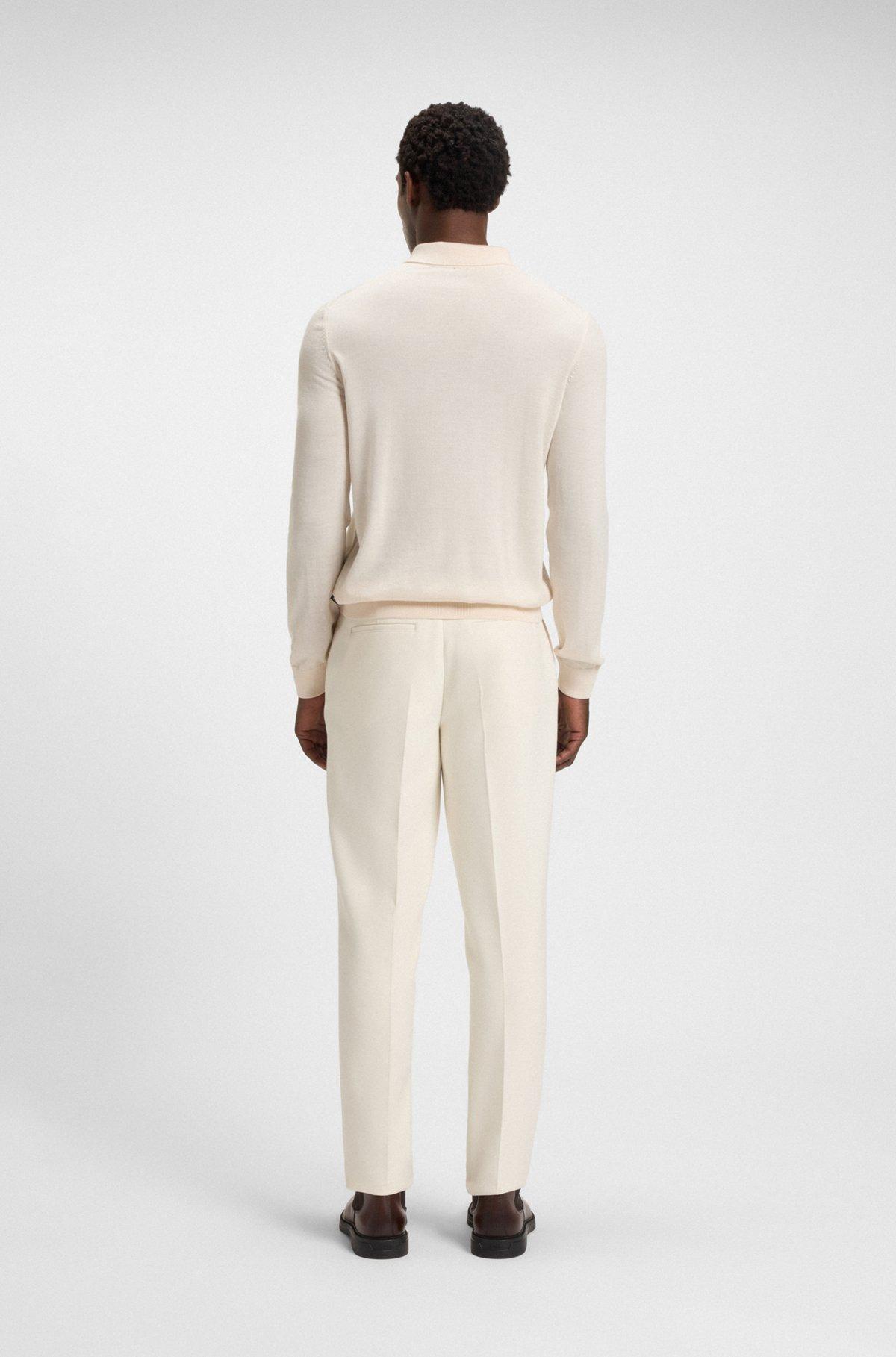 Knitted polo sweater in virgin wool Product Image