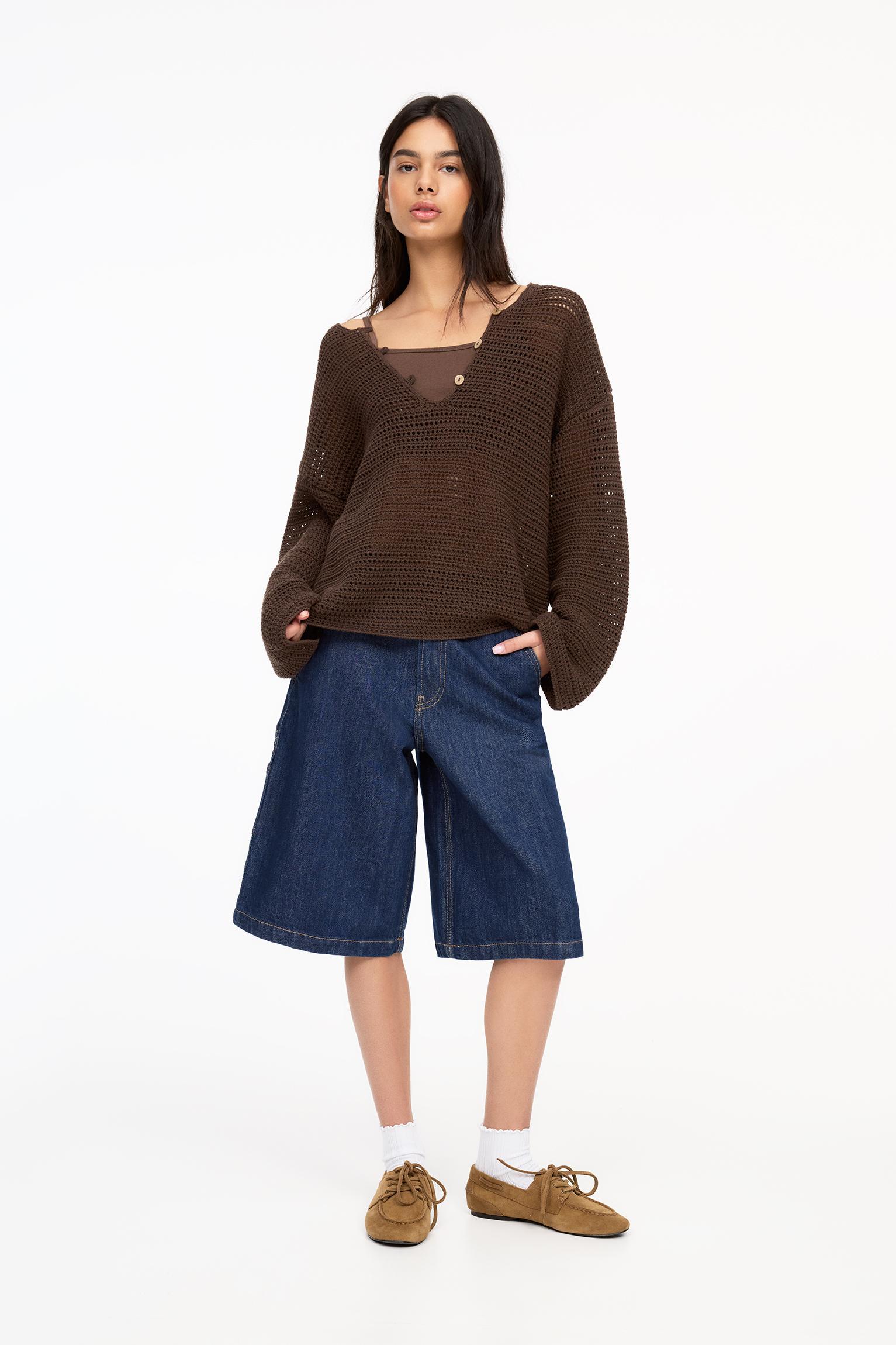 Open knit sweater with buttons Product Image