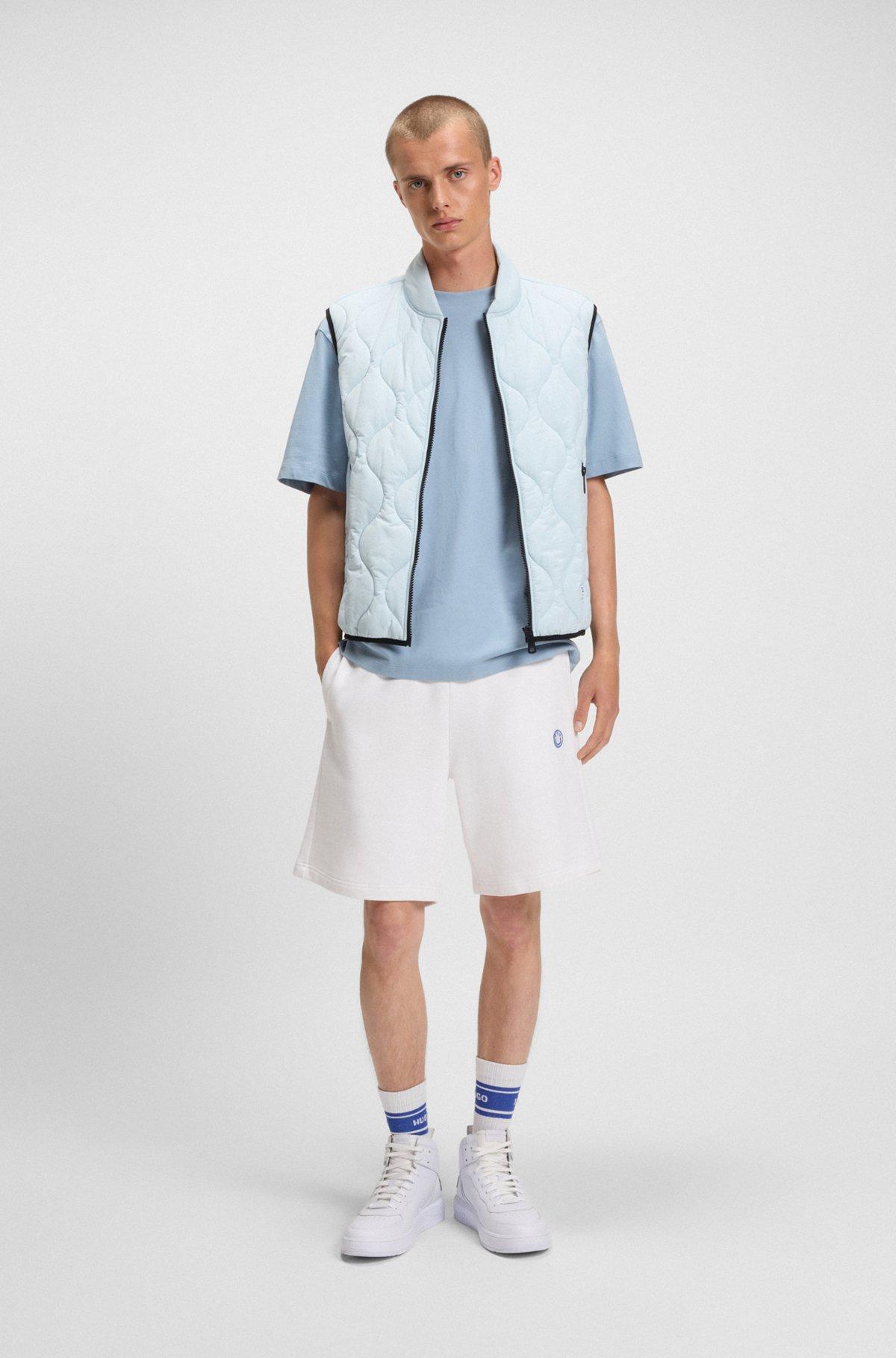 Cotton-terry shorts with Happy HUGO logo Product Image