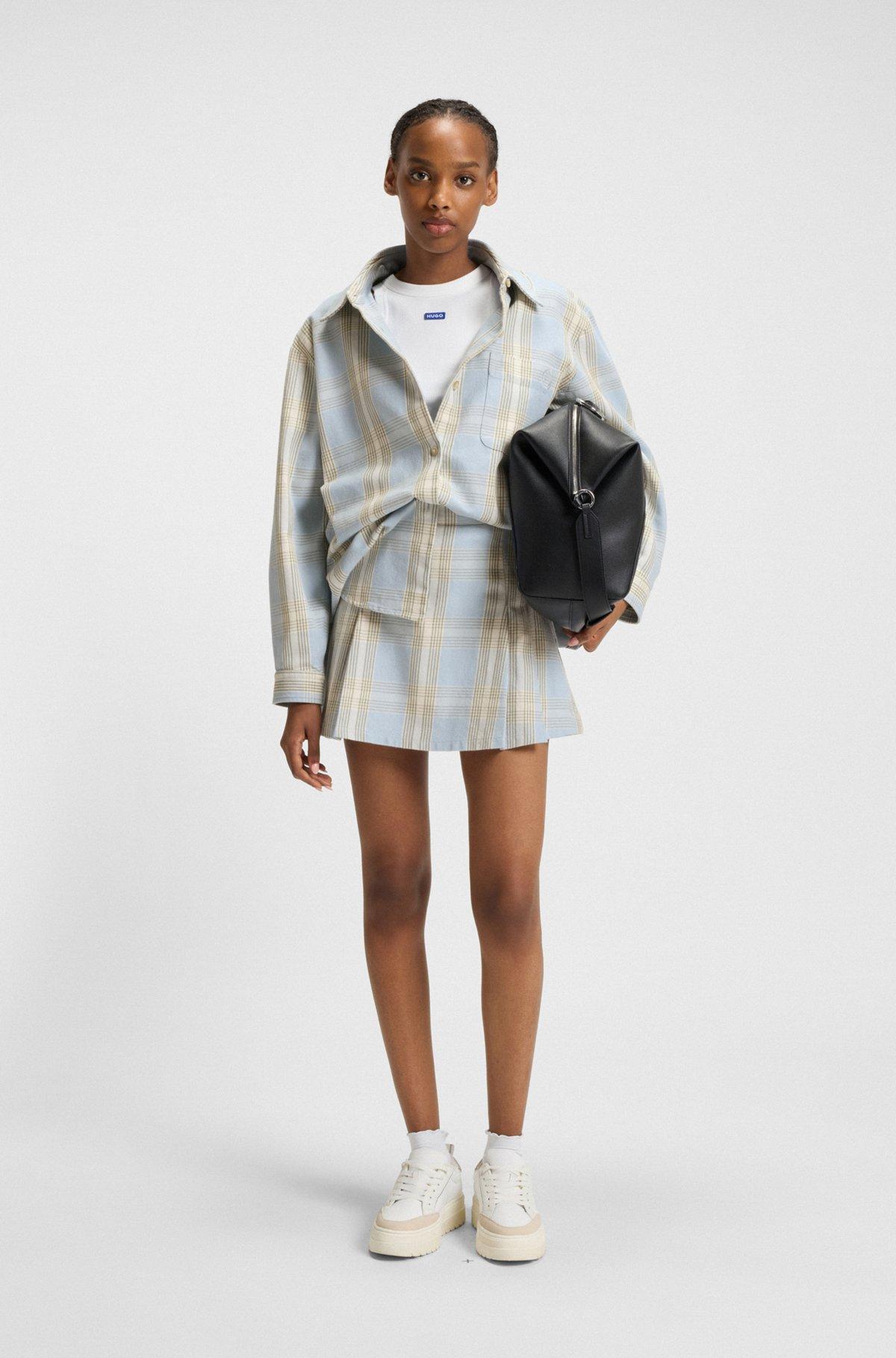 Pleated mini skirt in checked cotton twill Product Image