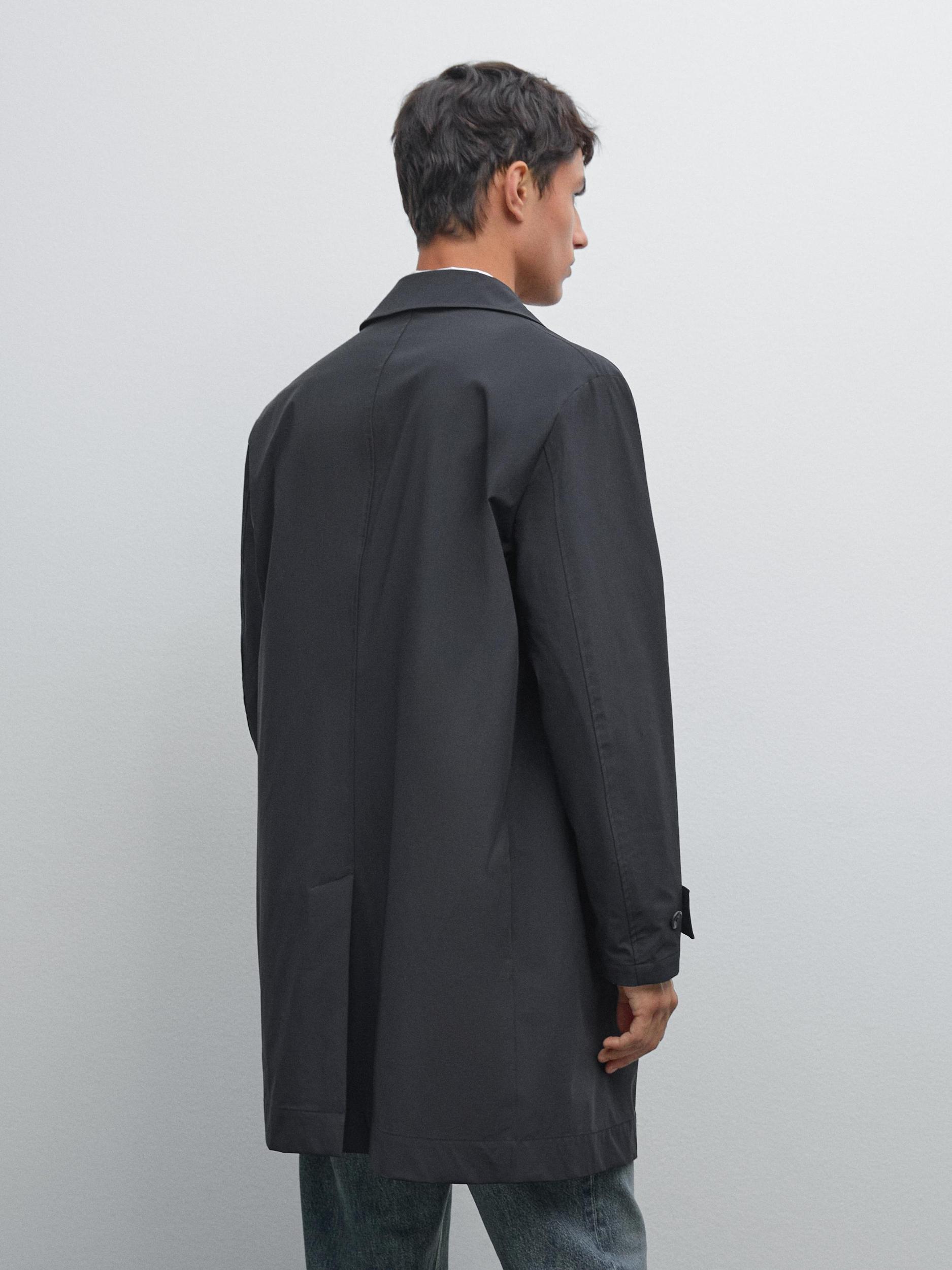 Lightweight trench coat with hidden buttons Product Image