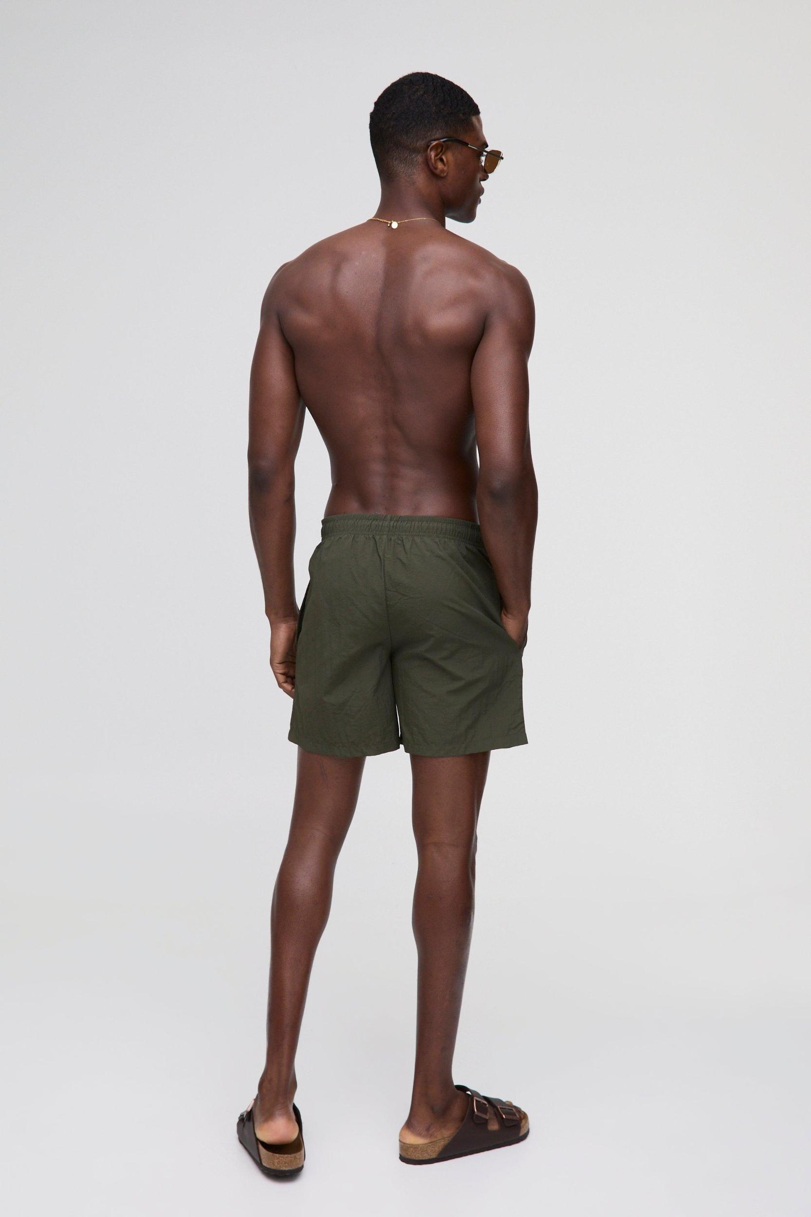 Elasticated Waist Relaxed Short Length Crinkle Nylon Embroidery Shorts | boohooMAN USA Product Image