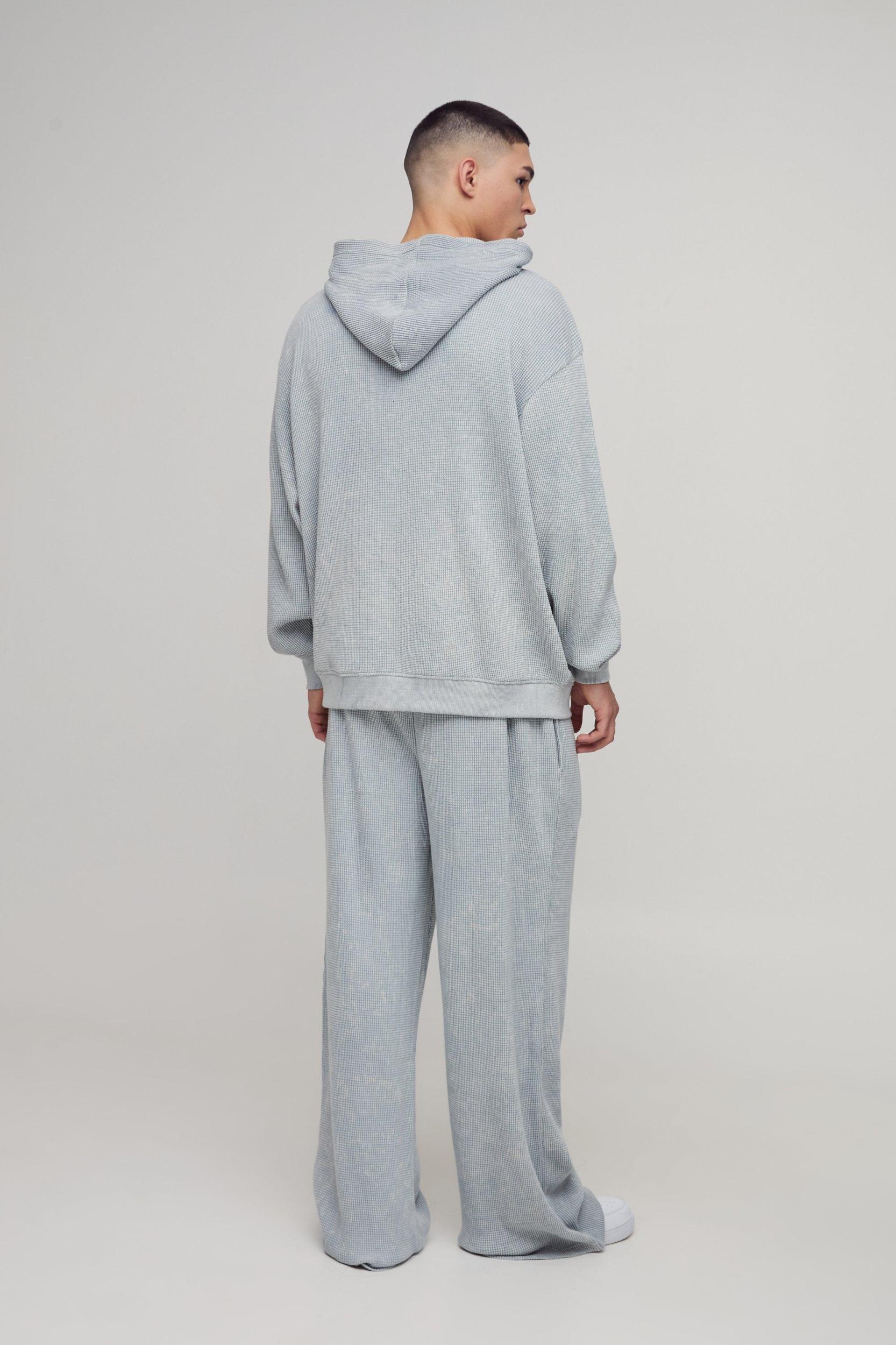 Oversized Acid Wash Heavy Waffle Hoodie with Woven Tab | boohooMAN USA Product Image