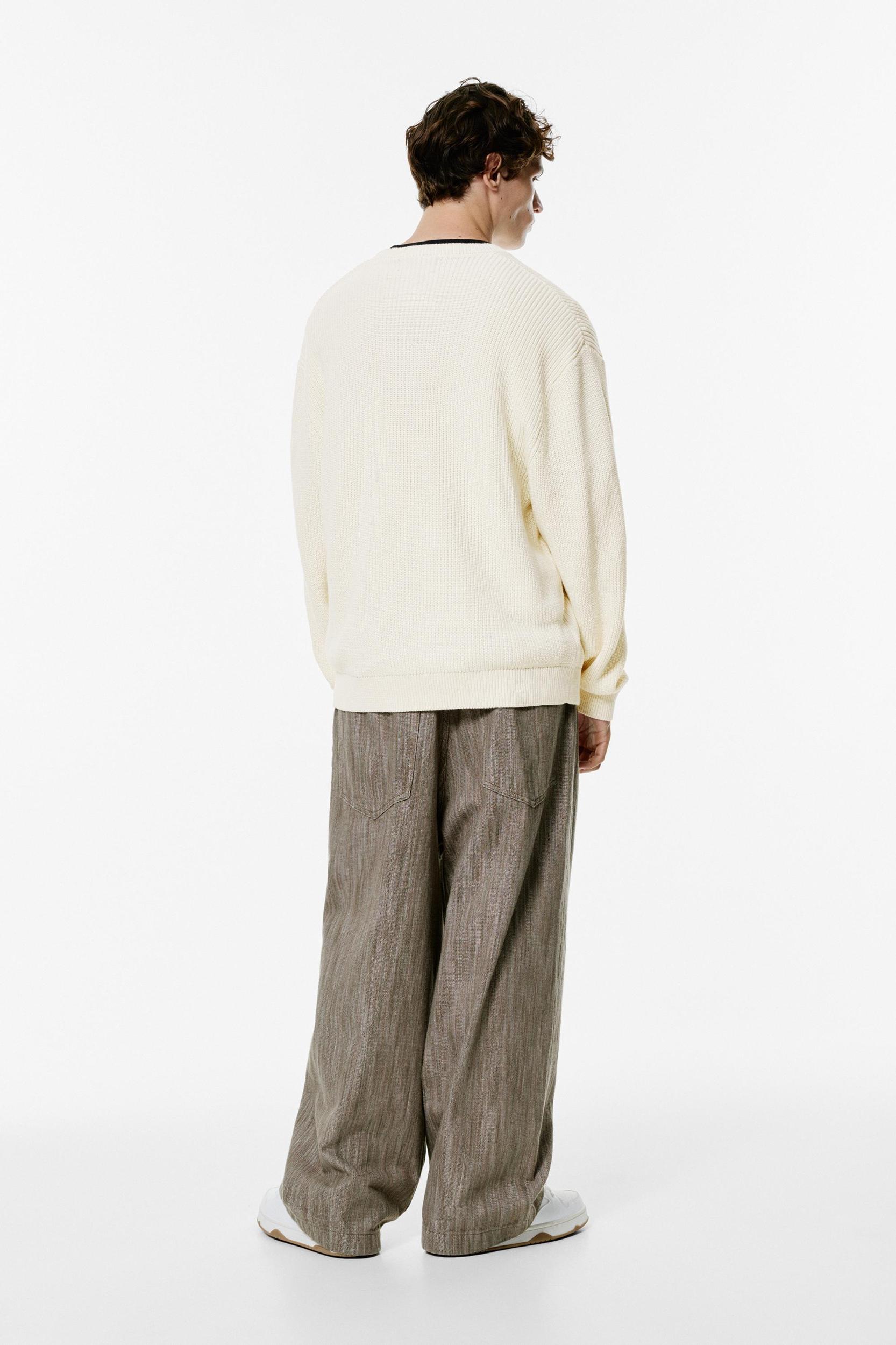 Knit jumper with embroidered text Product Image